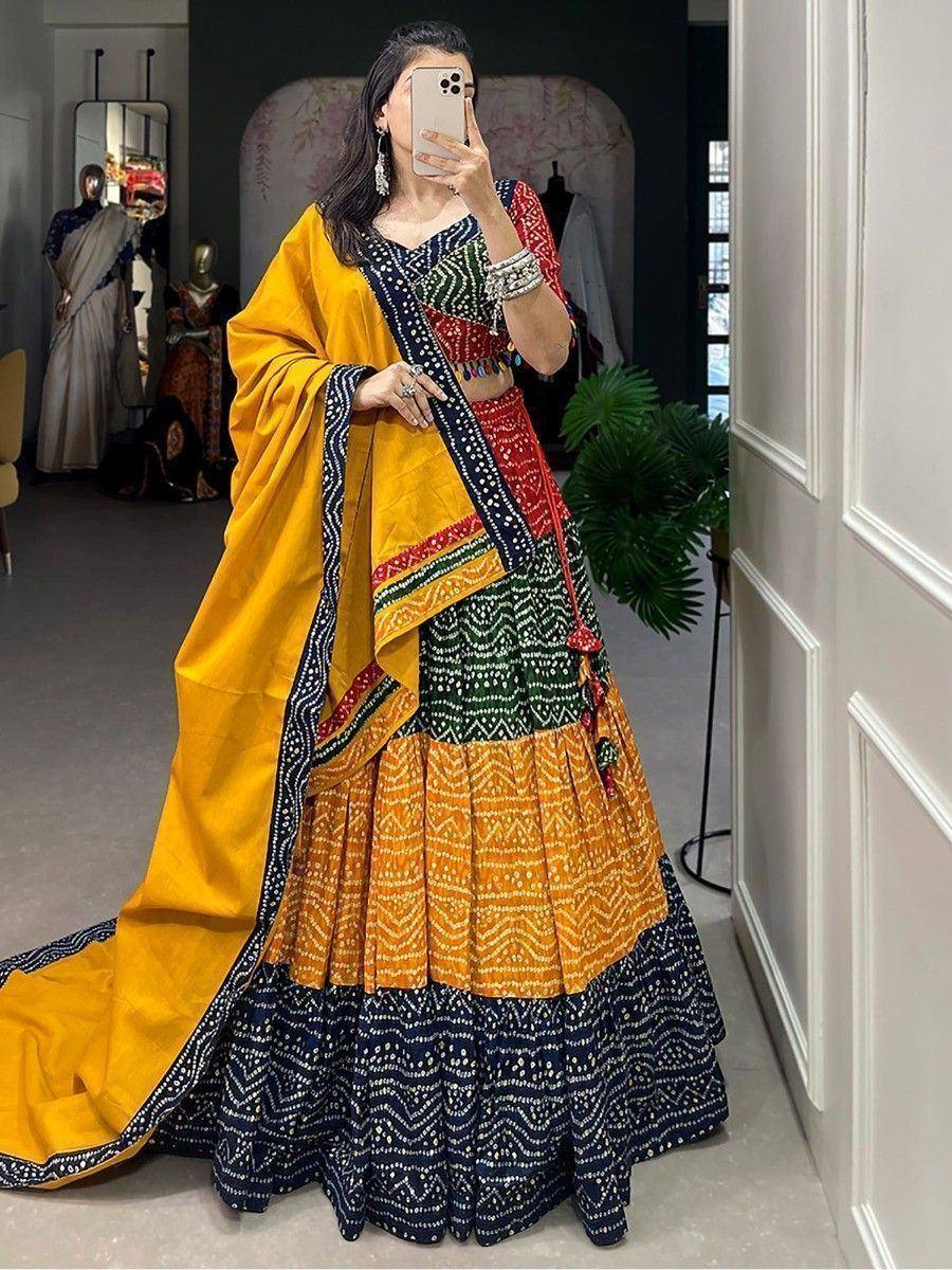 Vibrant yellow and navy blue printed lehenga choli with dupatta, perfect for Indian ethnic occasions