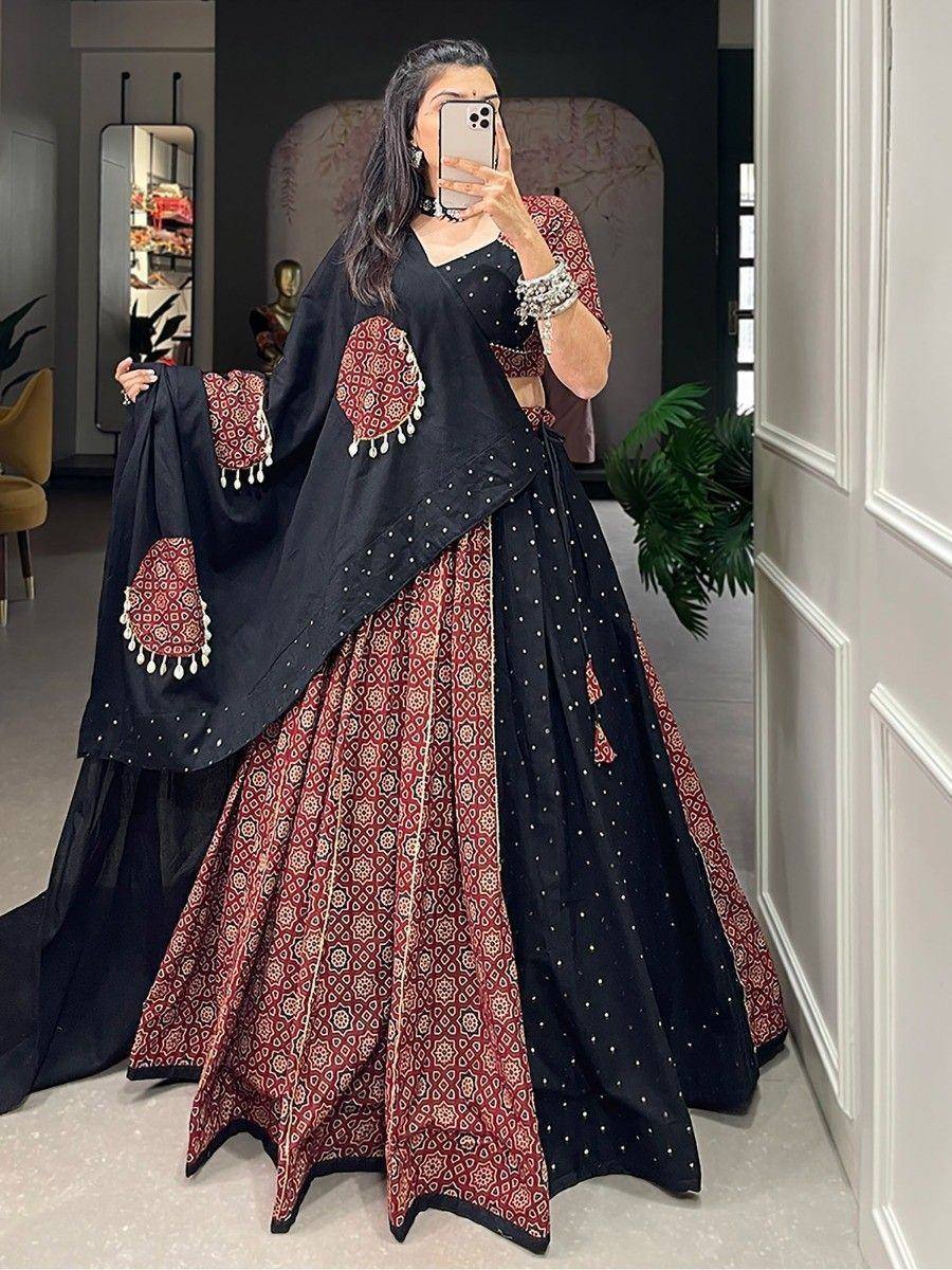 Black and maroon printed lehenga choli with tassel detailing, perfect for Indian ethnic occasions