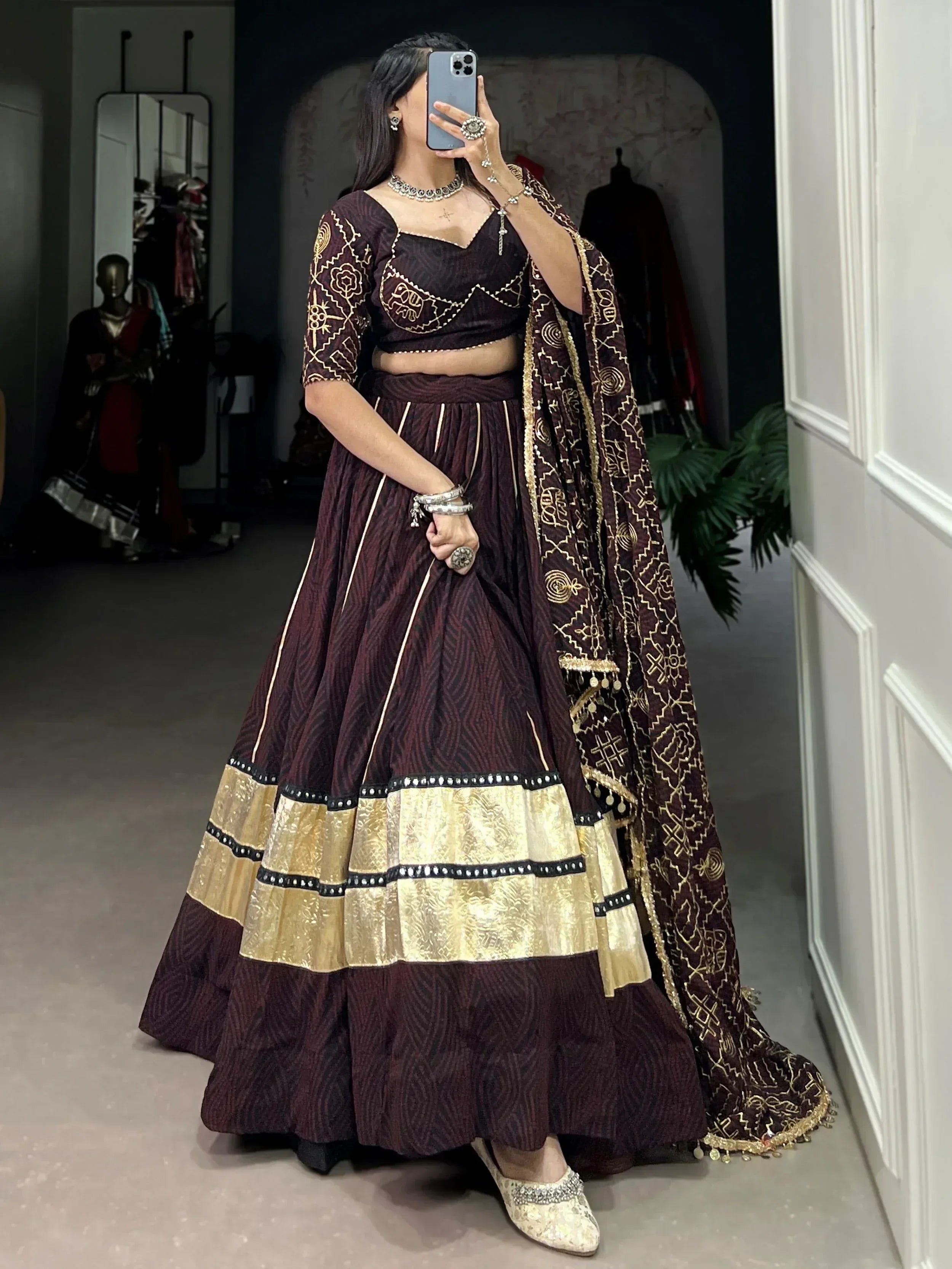 Maroon and gold embroidered lehenga choli with dupatta, ethnic Indian wear for weddings and festivals