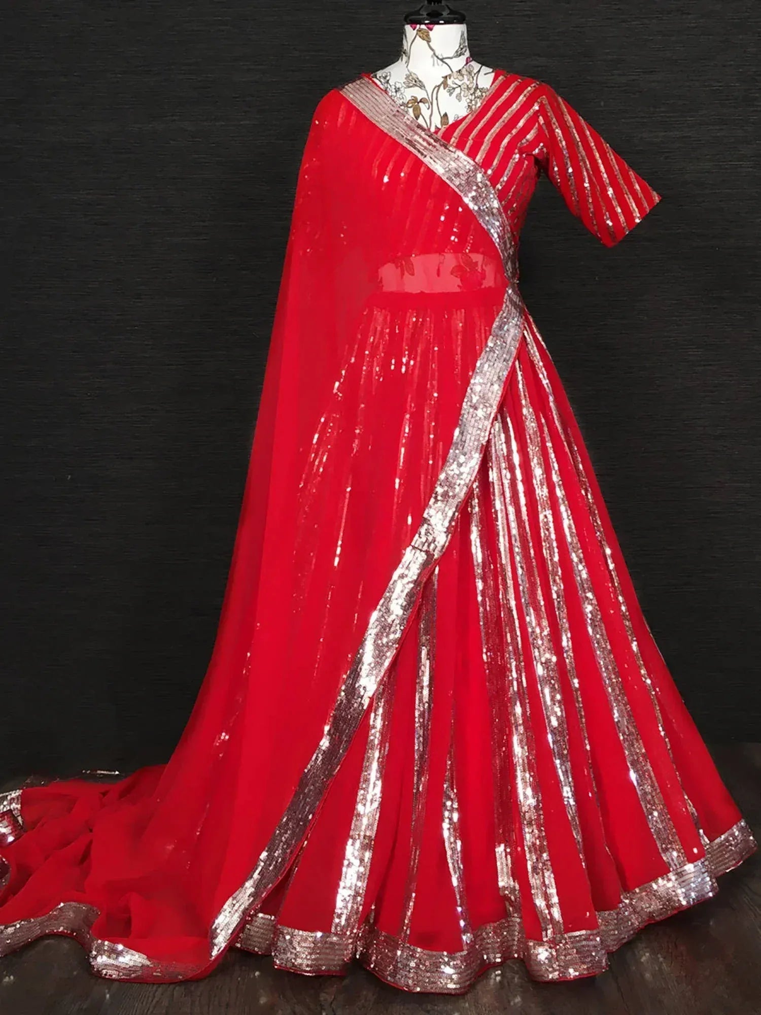 Red sequin lehenga choli with silver stripes, perfect for Indian ethnic wear and festive occasions.