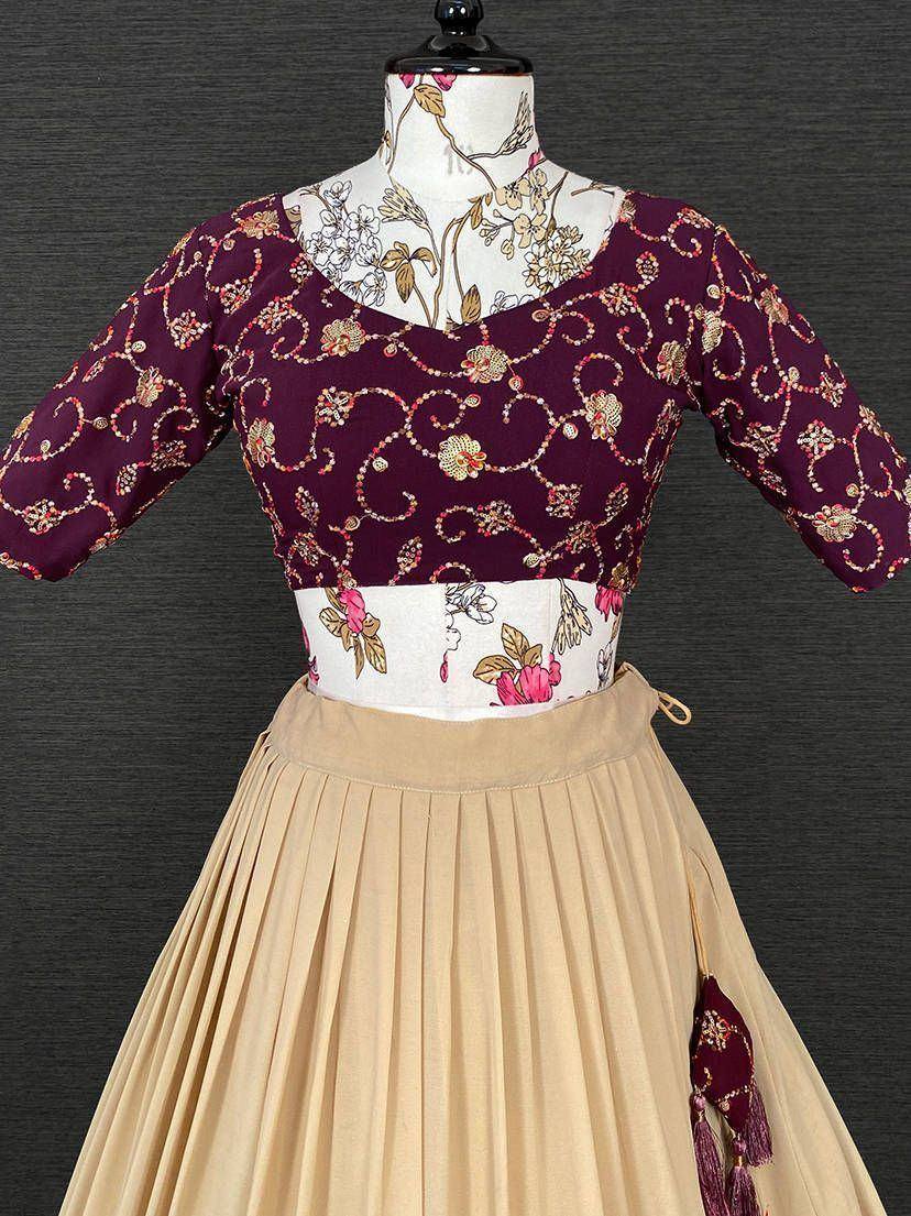 Maroon embroidered blouse with floral print and beige pleated skirt, Indian ethnic wear