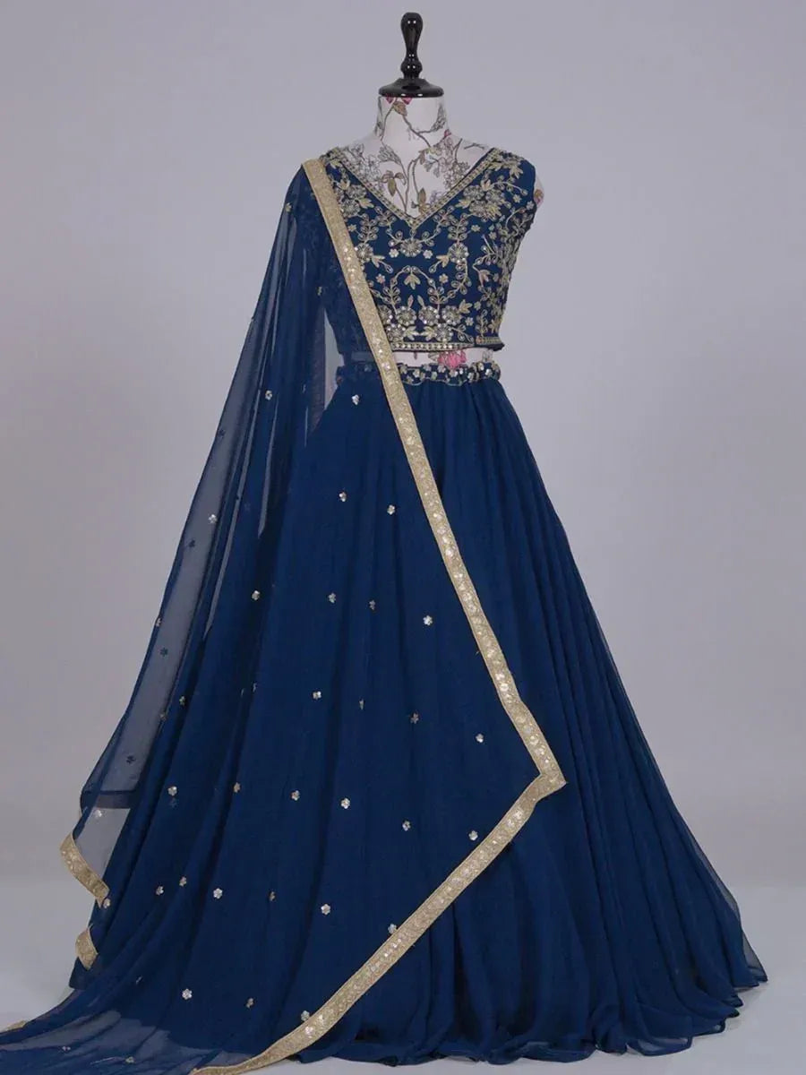 Navy blue designer lehenga choli with gold embroidery and sheer dupatta for Indian ethnic wear