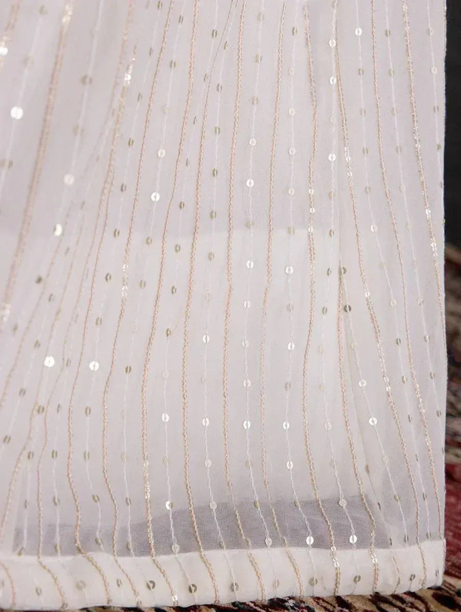 White sheer fabric with gold thread and sequin detailing for ethnic wear