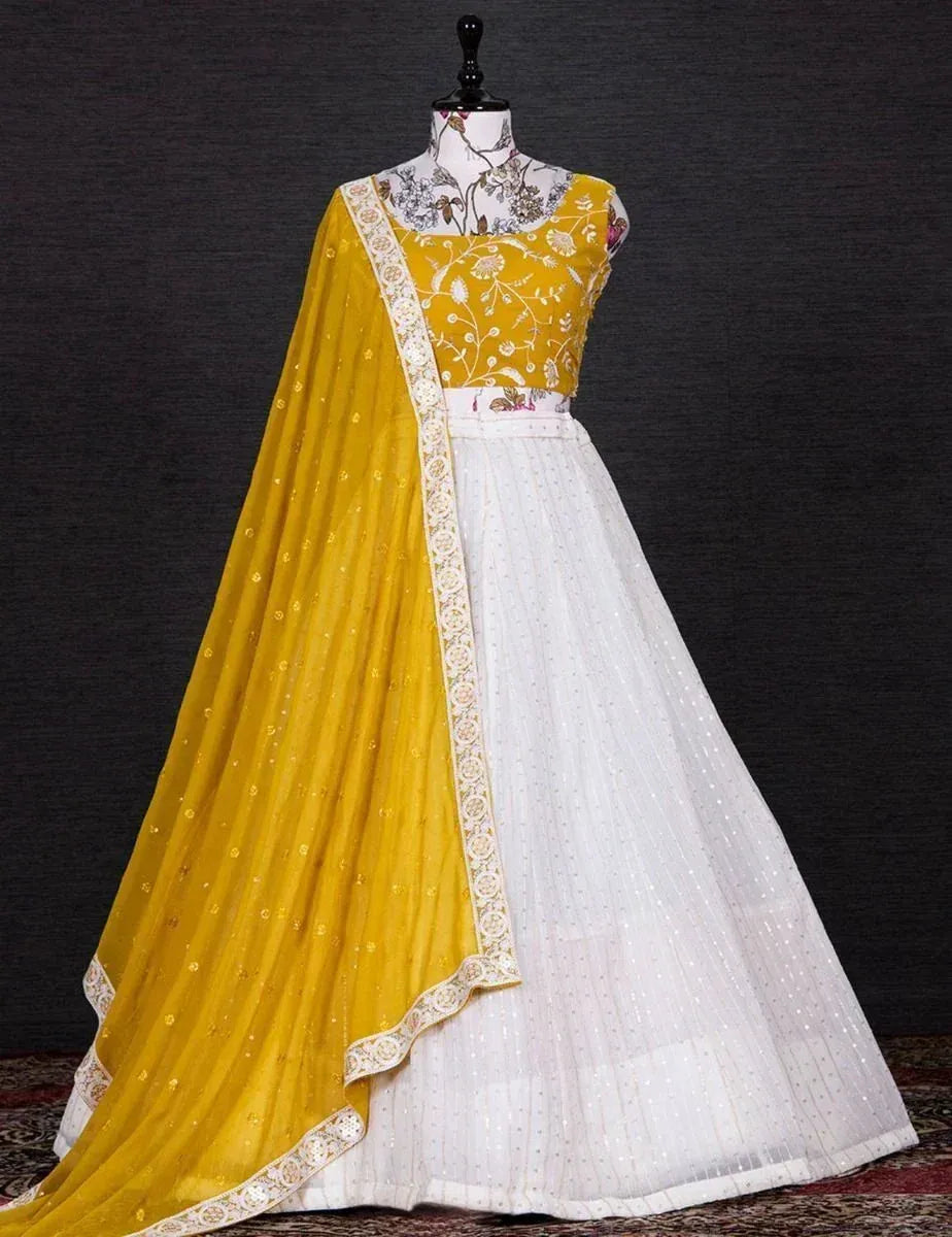 Yellow and white embroidered lehenga choli with floral dupatta, Indian ethnic wear