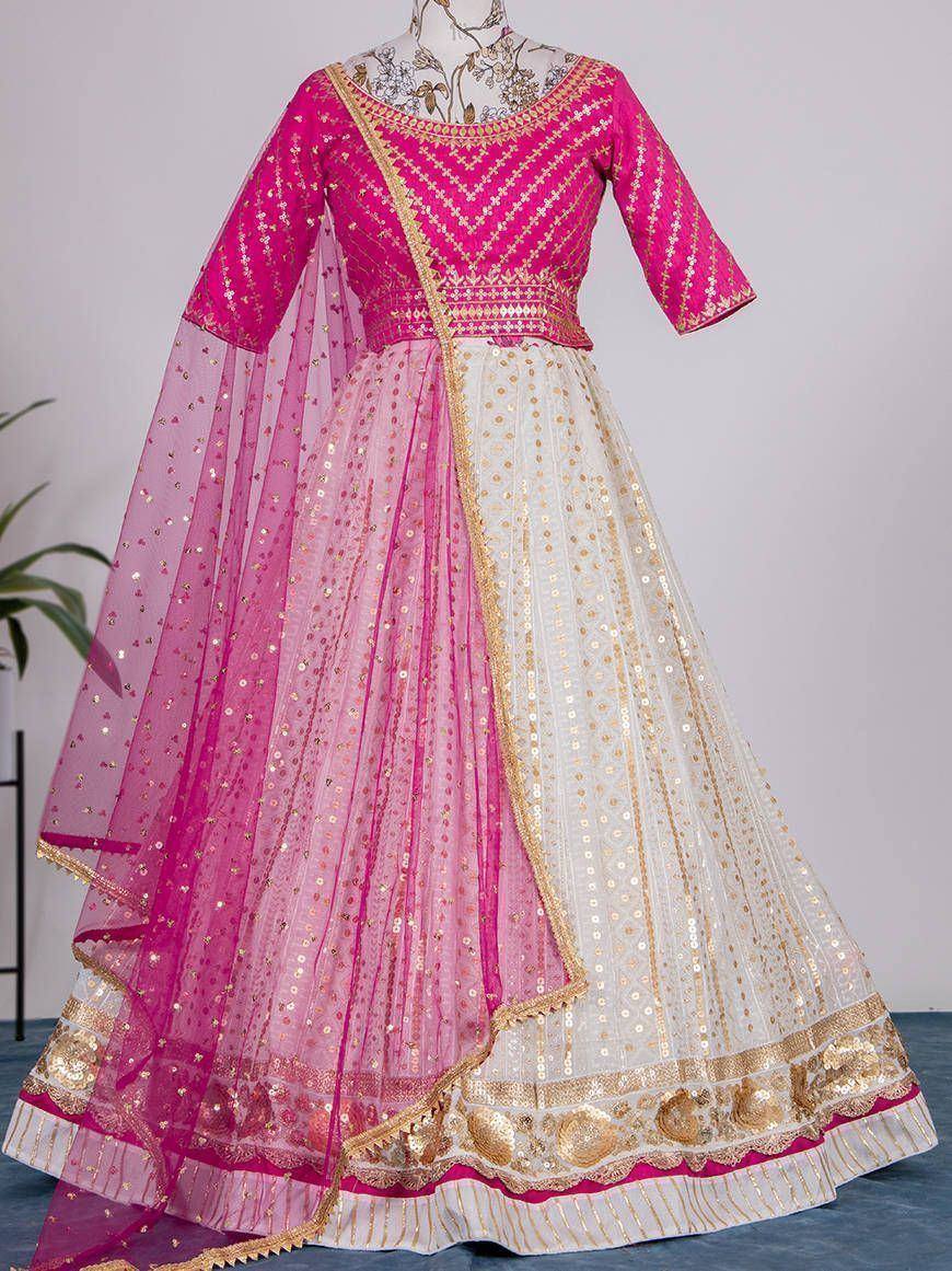 Pink and white designer lehenga choli with gold embroidery and sequins, perfect for weddings and festive occasions