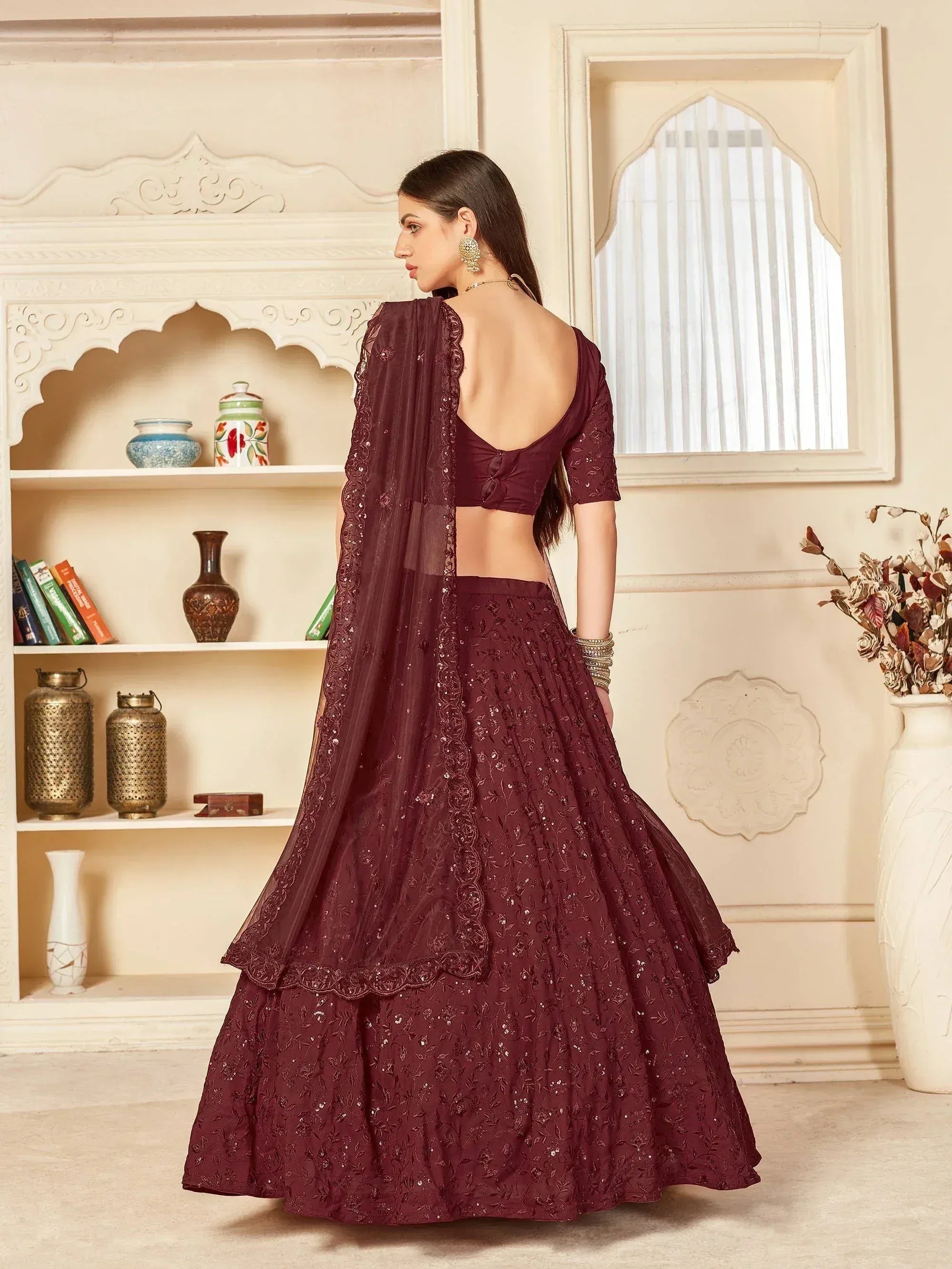 Burgundy embroidered lehenga choli with open back blouse and sheer dupatta, Indian ethnic wear