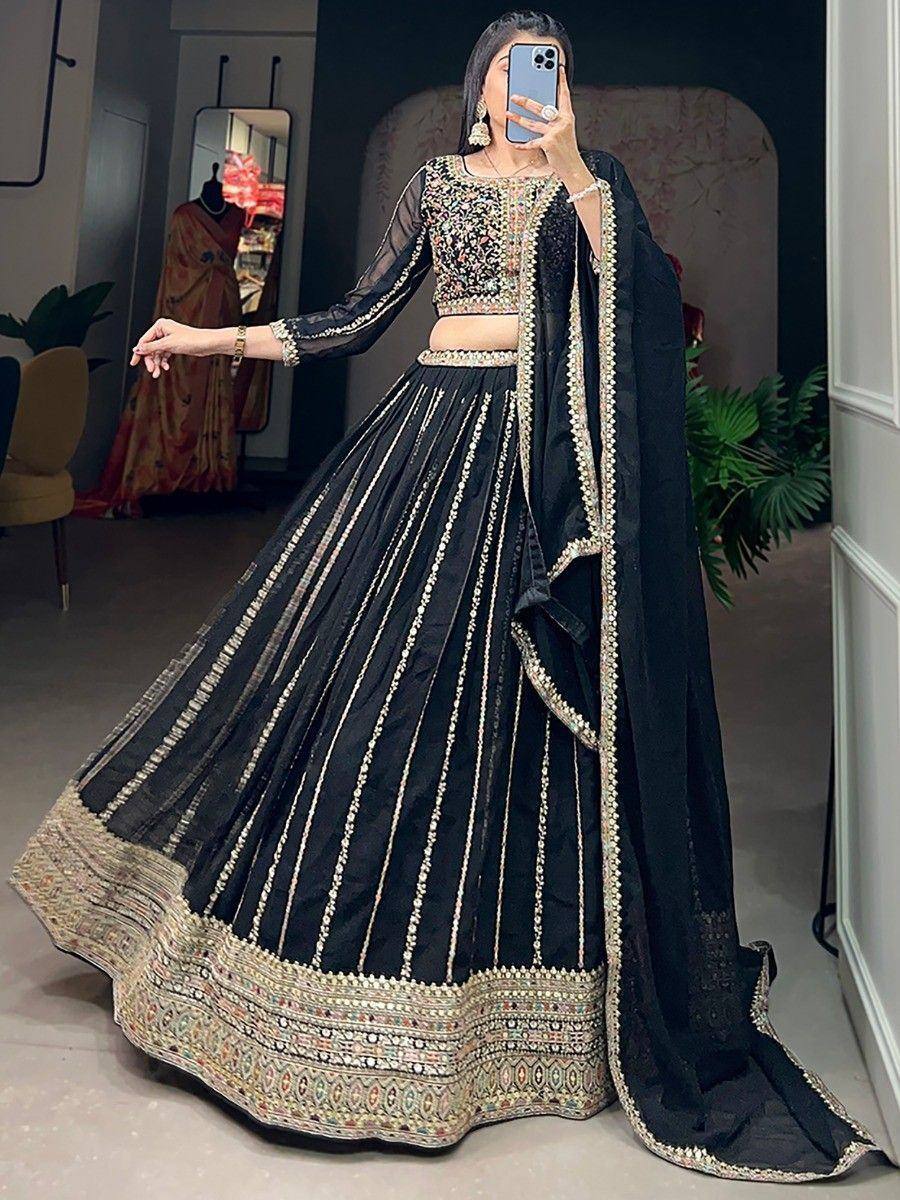 Black embroidered lehenga choli with gold detailing, perfect for Indian ethnic wear occasions