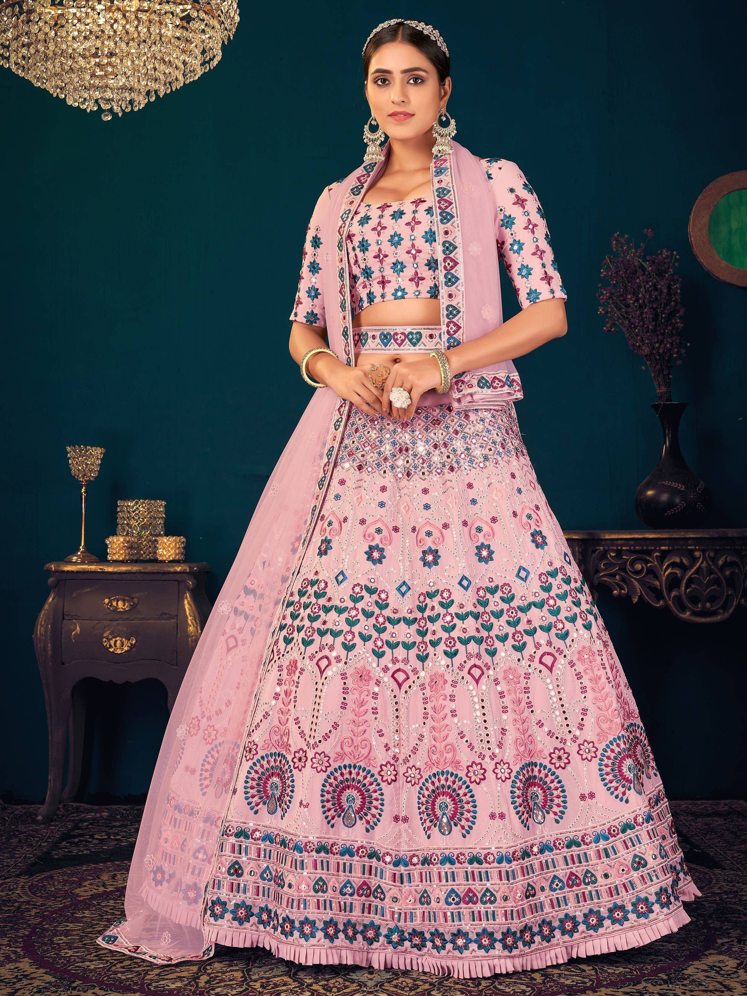Pink embroidered lehenga choli with floral mirror work, perfect for Indian weddings and festive occasions