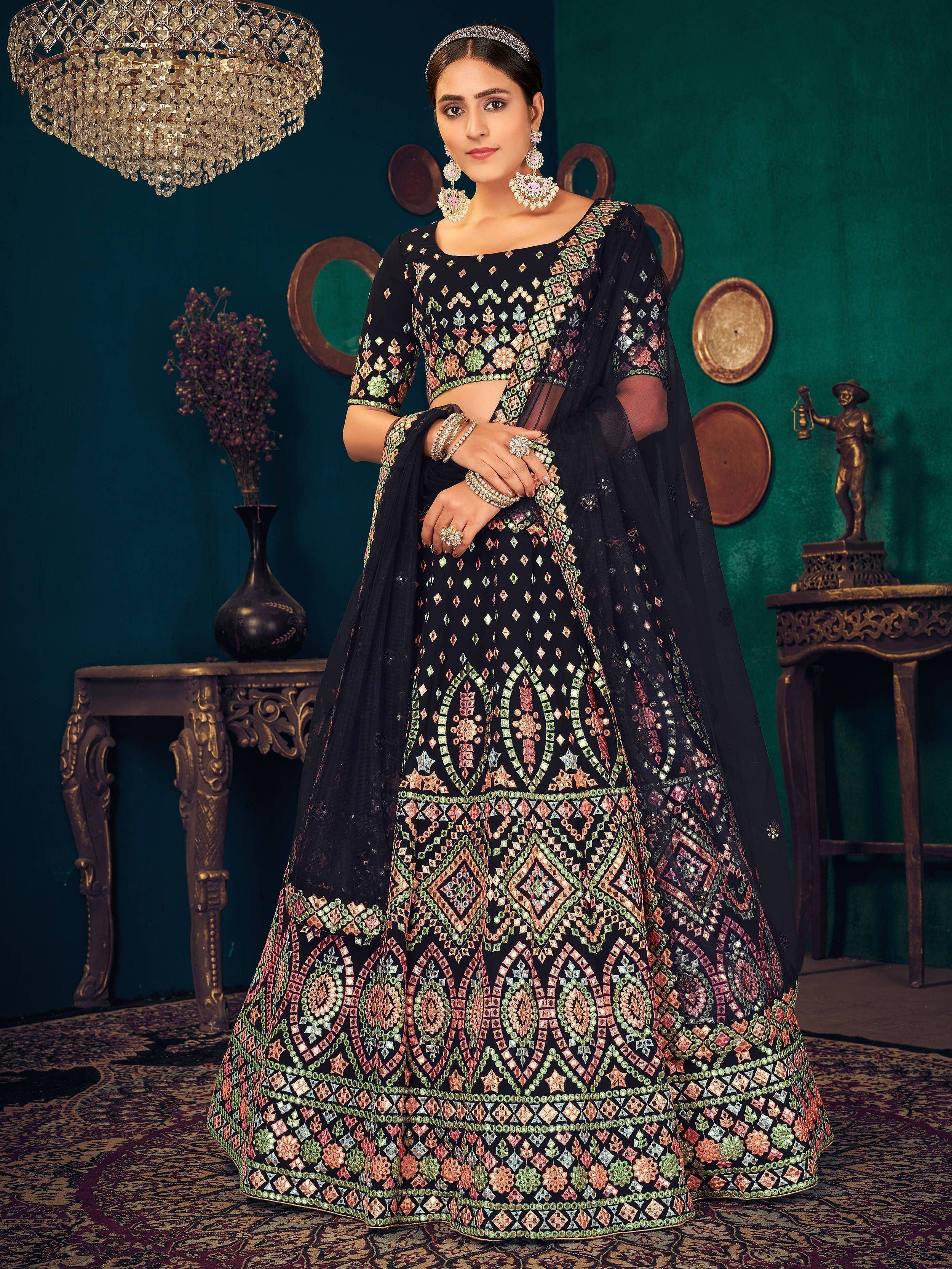 Black embroidered lehenga choli with colorful mirror work, perfect for Indian ethnic wear
