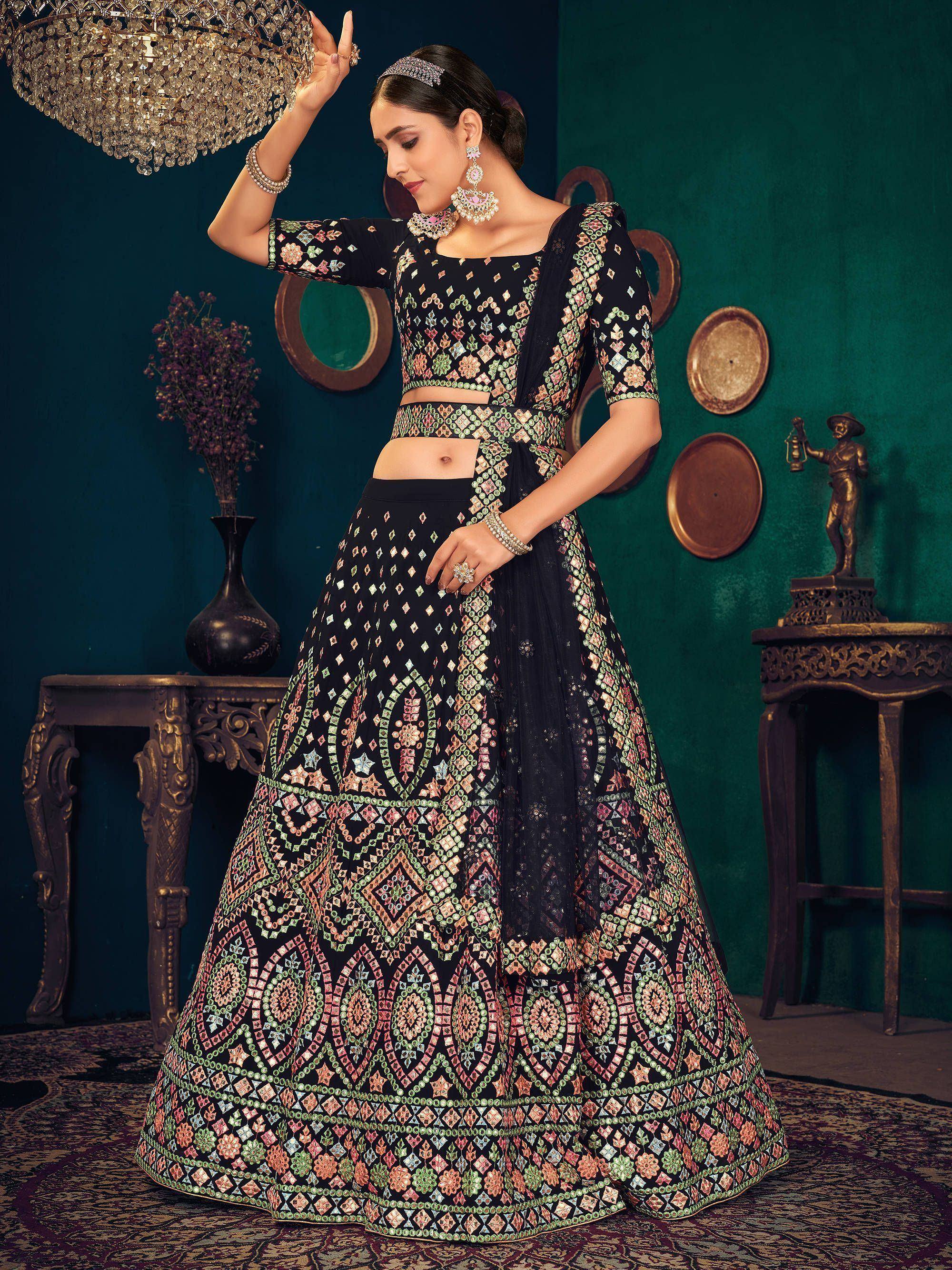 Black embroidered lehenga choli with colorful mirror work, perfect for Indian ethnic wear