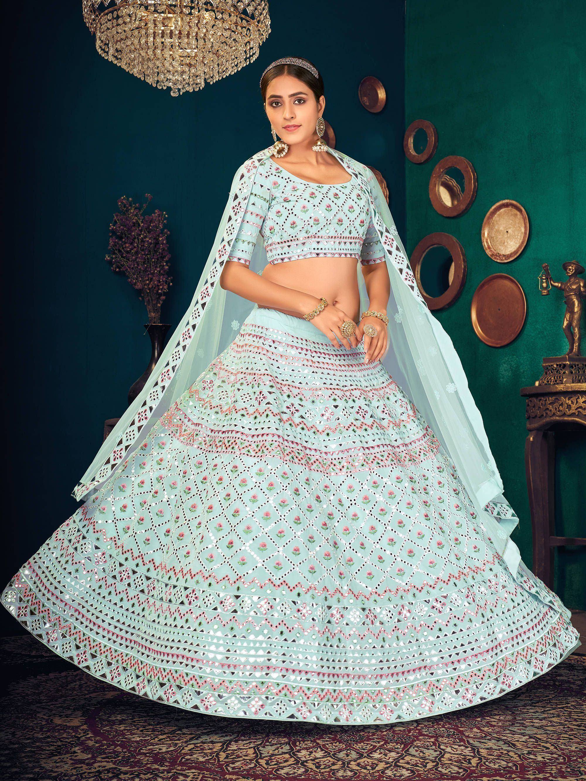 Mint green designer lehenga choli with floral mirror work and dupatta, perfect for Indian ethnic occasions