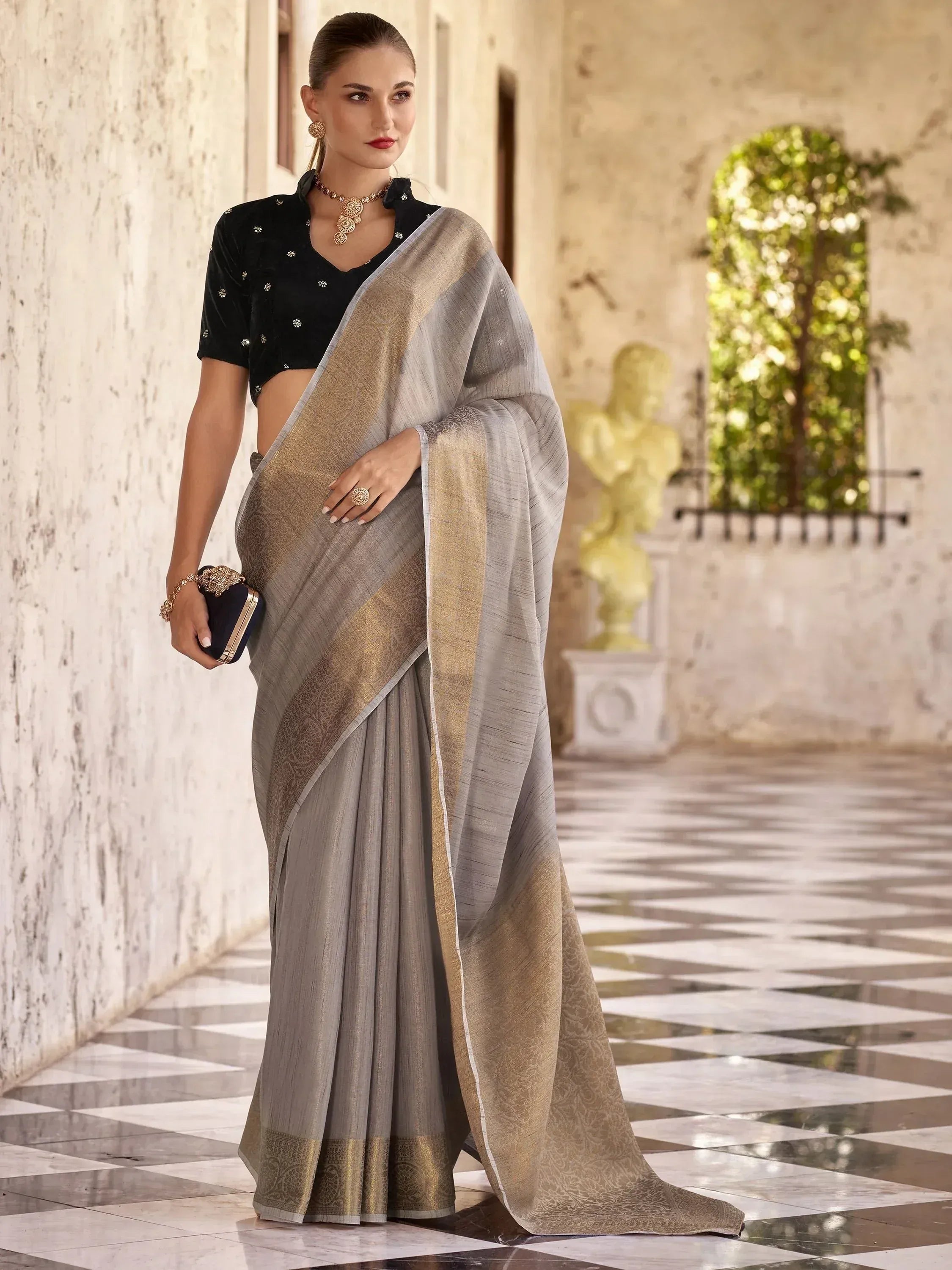 Grey and gold designer saree with black velvet blouse, perfect for ethnic occasions
