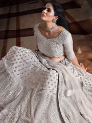 Glamorous Grey Sequins Embroidered Net Wedding Wear Lehenga Choli