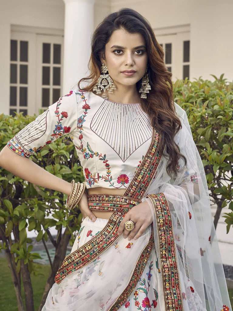 Incredible White Sequins Embroidered Silk Wedding Wear Lehenga Choli