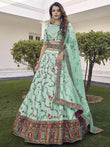 Spectacular Pista Green Thread Embroidered Silk Wedding Wear Lehenga Choli