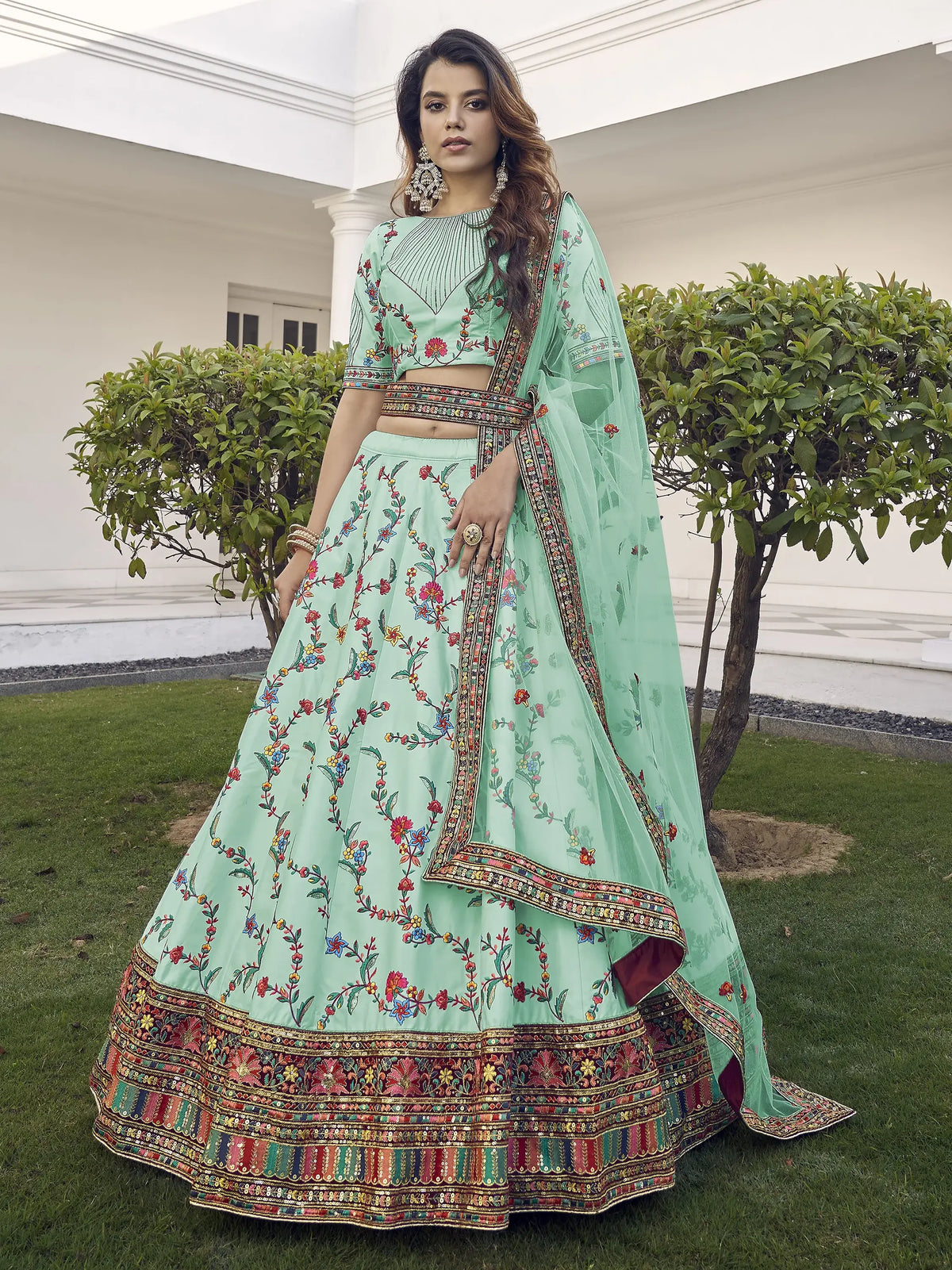 Spectacular Pista Green Thread Embroidered Silk Wedding Wear Lehenga Choli