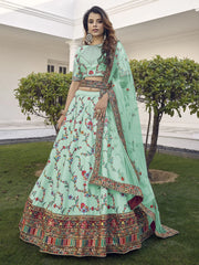 Spectacular Pista Green Thread Embroidered Silk Wedding Wear Lehenga Choli