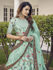 Spectacular Pista Green Thread Embroidered Silk Wedding Wear Lehenga Choli