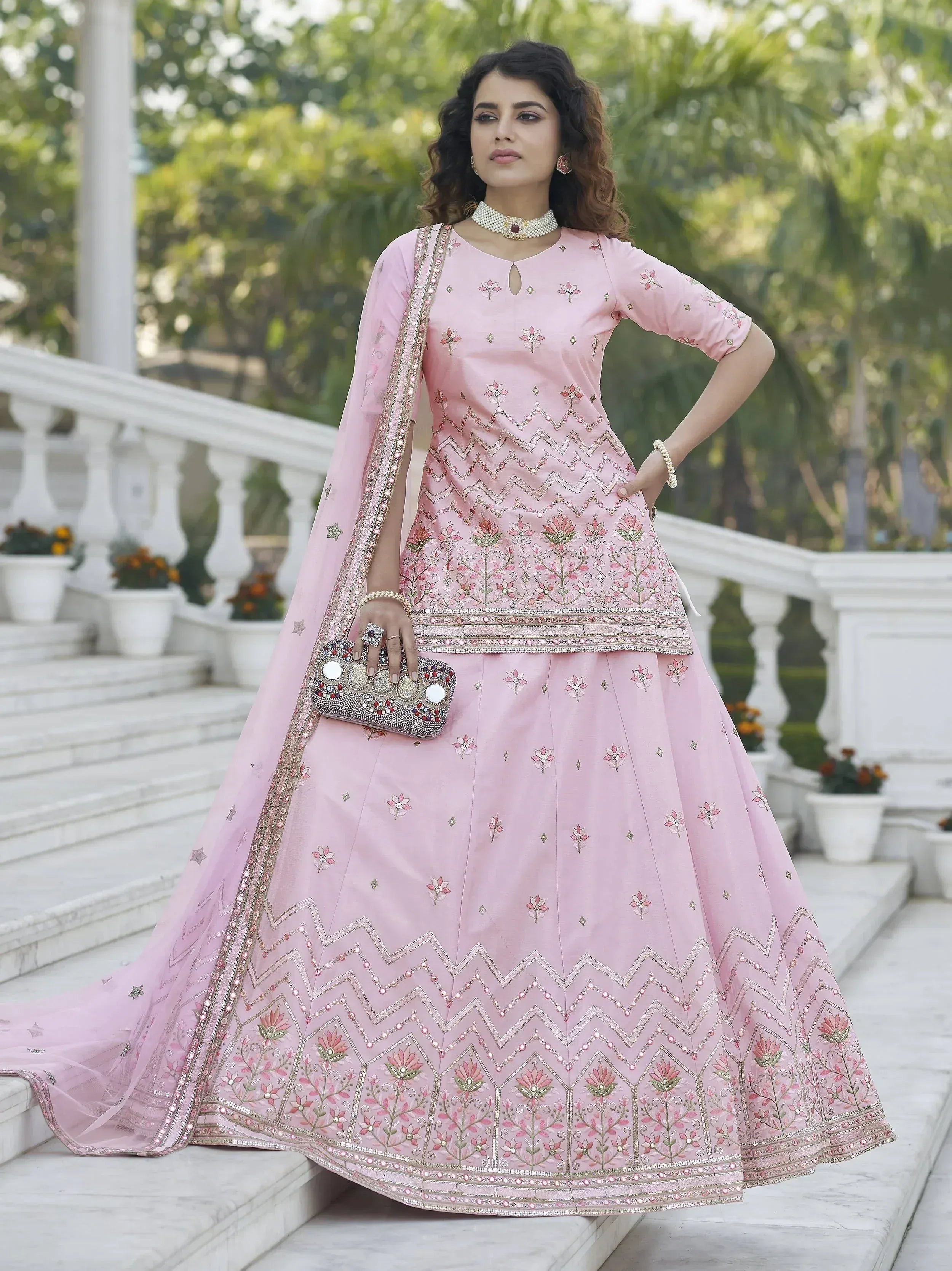 Pink embroidered lehenga choli with floral motifs and dupatta, perfect for Indian ethnic wear occasions