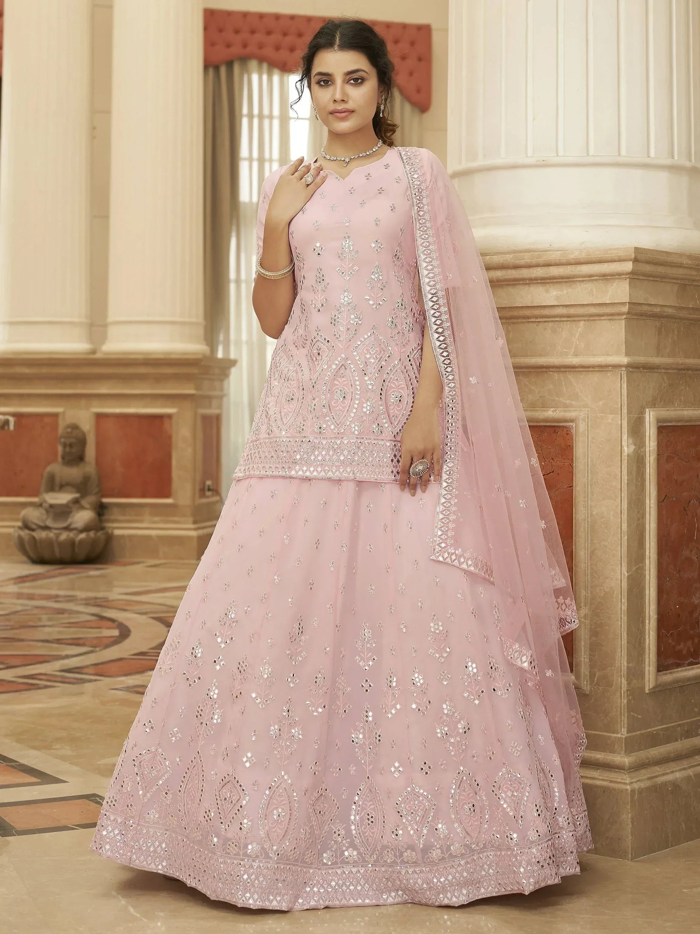 Pink embroidered lehenga choli with mirror work, perfect for Indian ethnic occasions and weddings