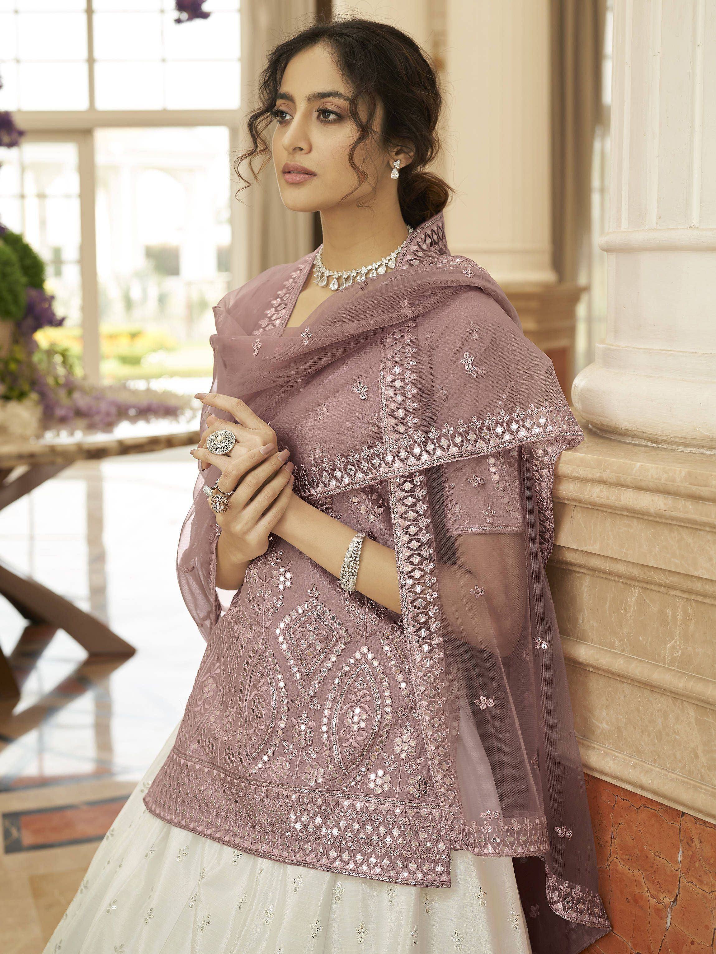 Elegant mauve embroidered lehenga choli with sheer dupatta, perfect for Indian ethnic wear occasions