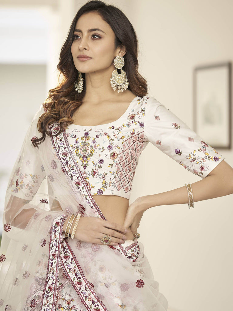 Fascinating White Embroidered Silk Party Wear Lehenga Choli