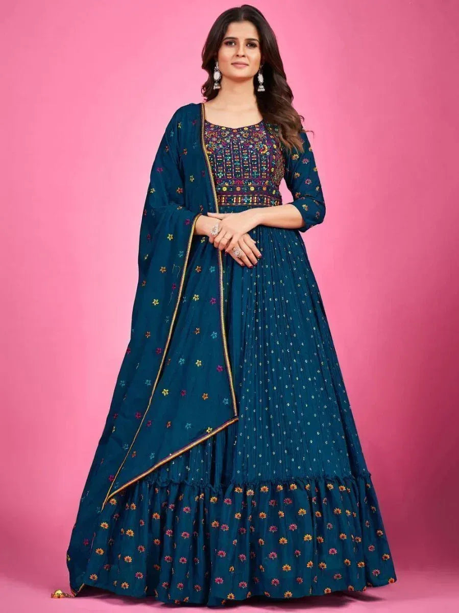 Teal embroidered anarkali suit with floral motifs and gold trim, perfect for Indian ethnic occasions