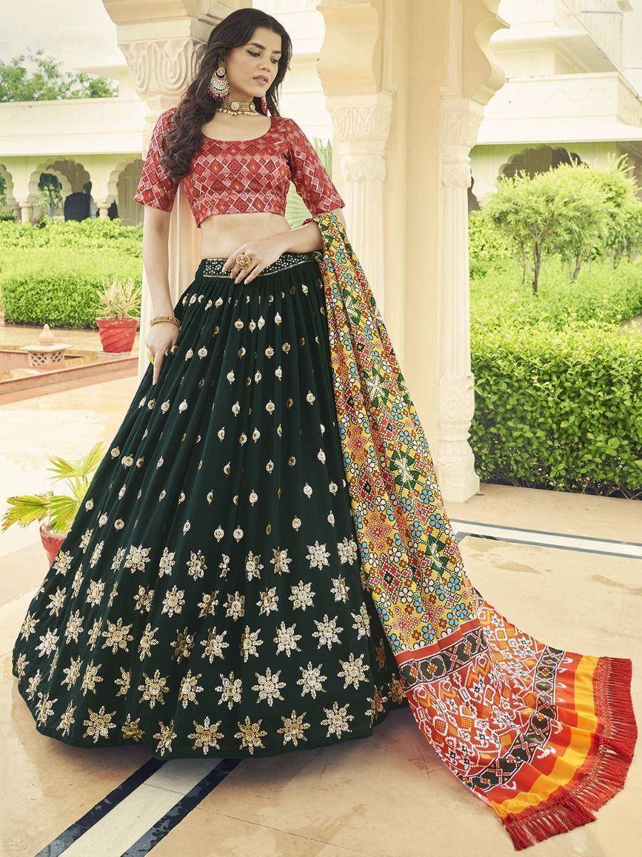 Elegant green embroidered lehenga choli with colorful dupatta, perfect for Indian ethnic wear occasions