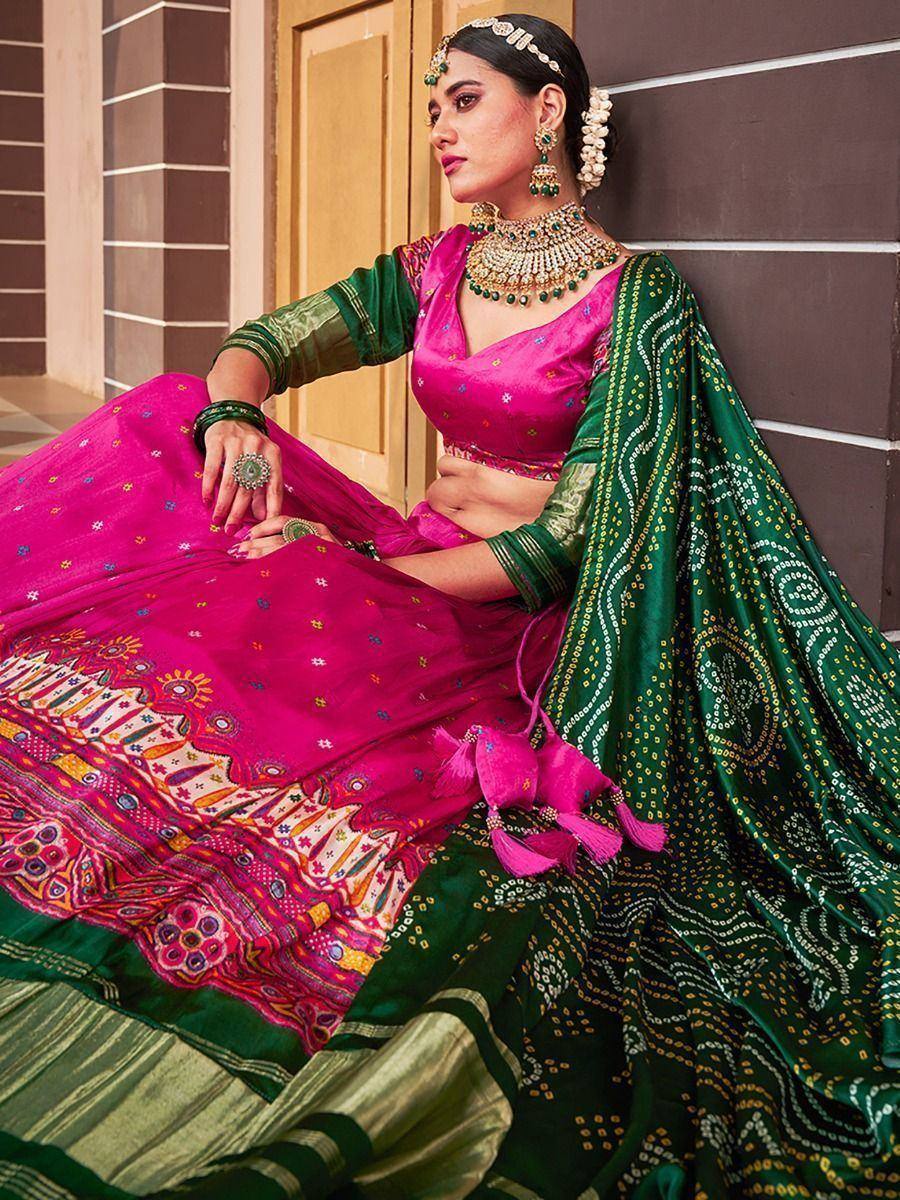 Pink and green embroidered lehenga choli with traditional jewelry, perfect for Indian ethnic wear occasions