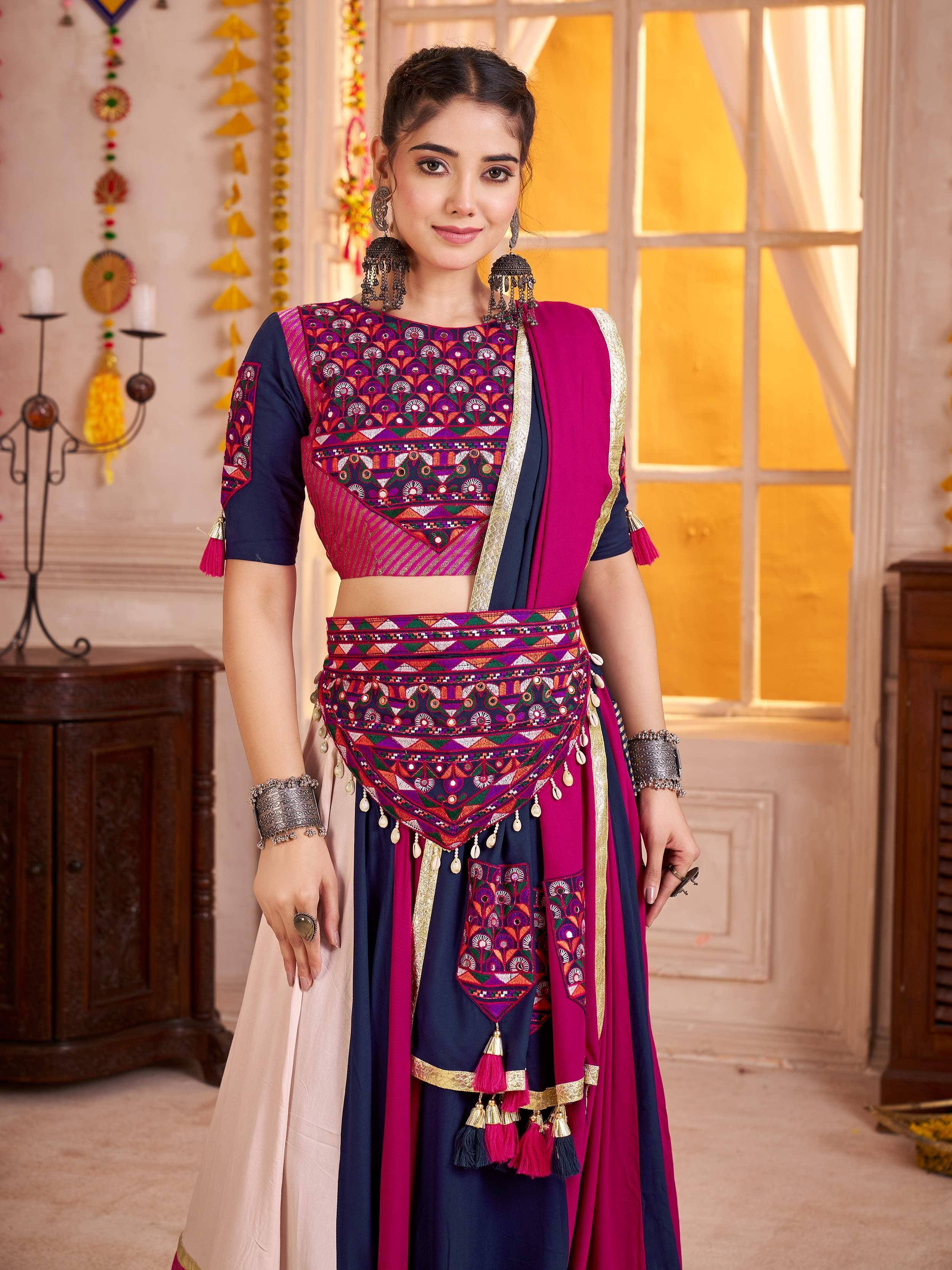 Ethnic Indian lehenga choli with vibrant embroidery and tassels, perfect for festive occasions.