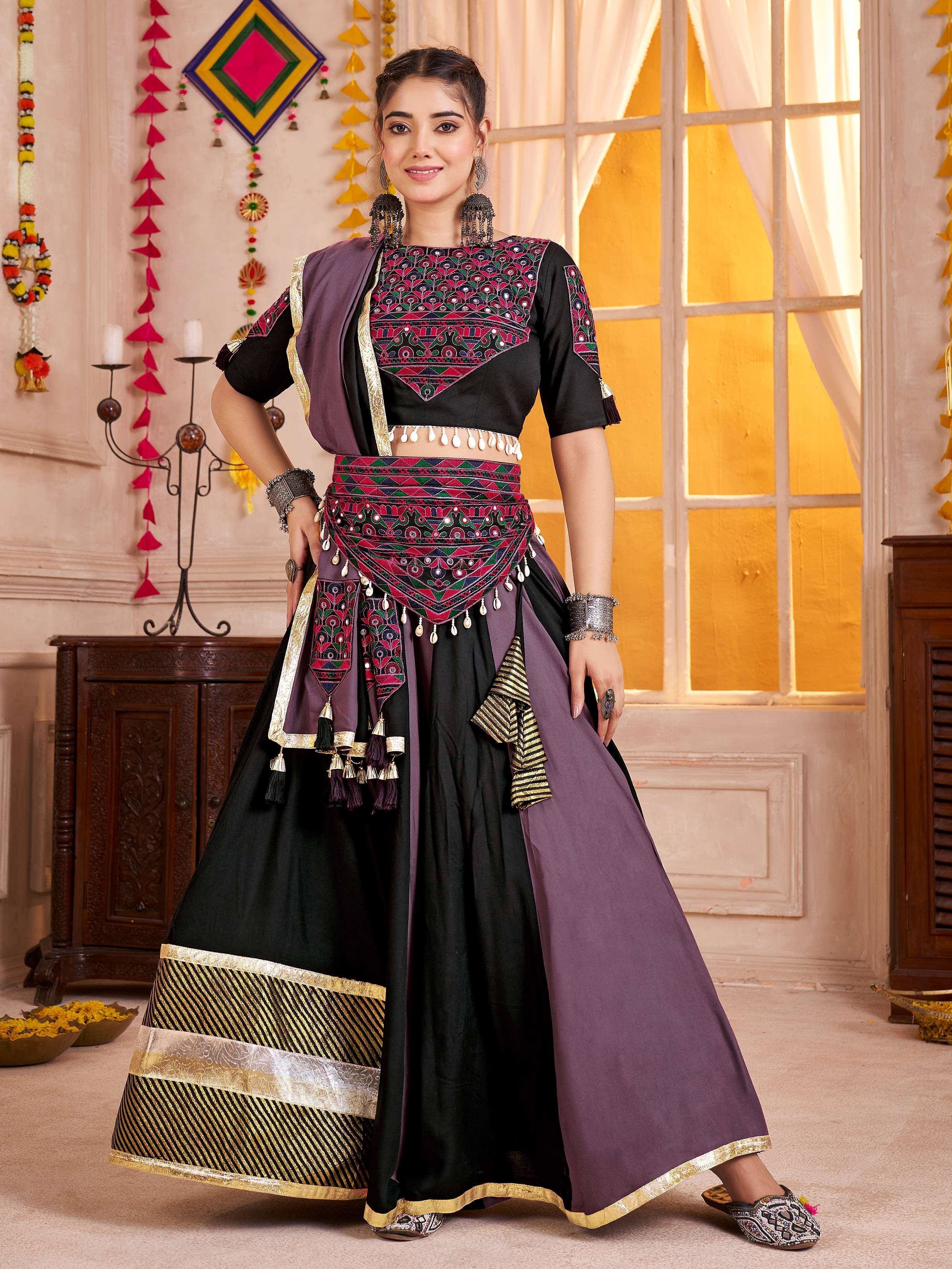 Black and purple embroidered lehenga choli with mirror work, perfect for Indian ethnic wear occasions.