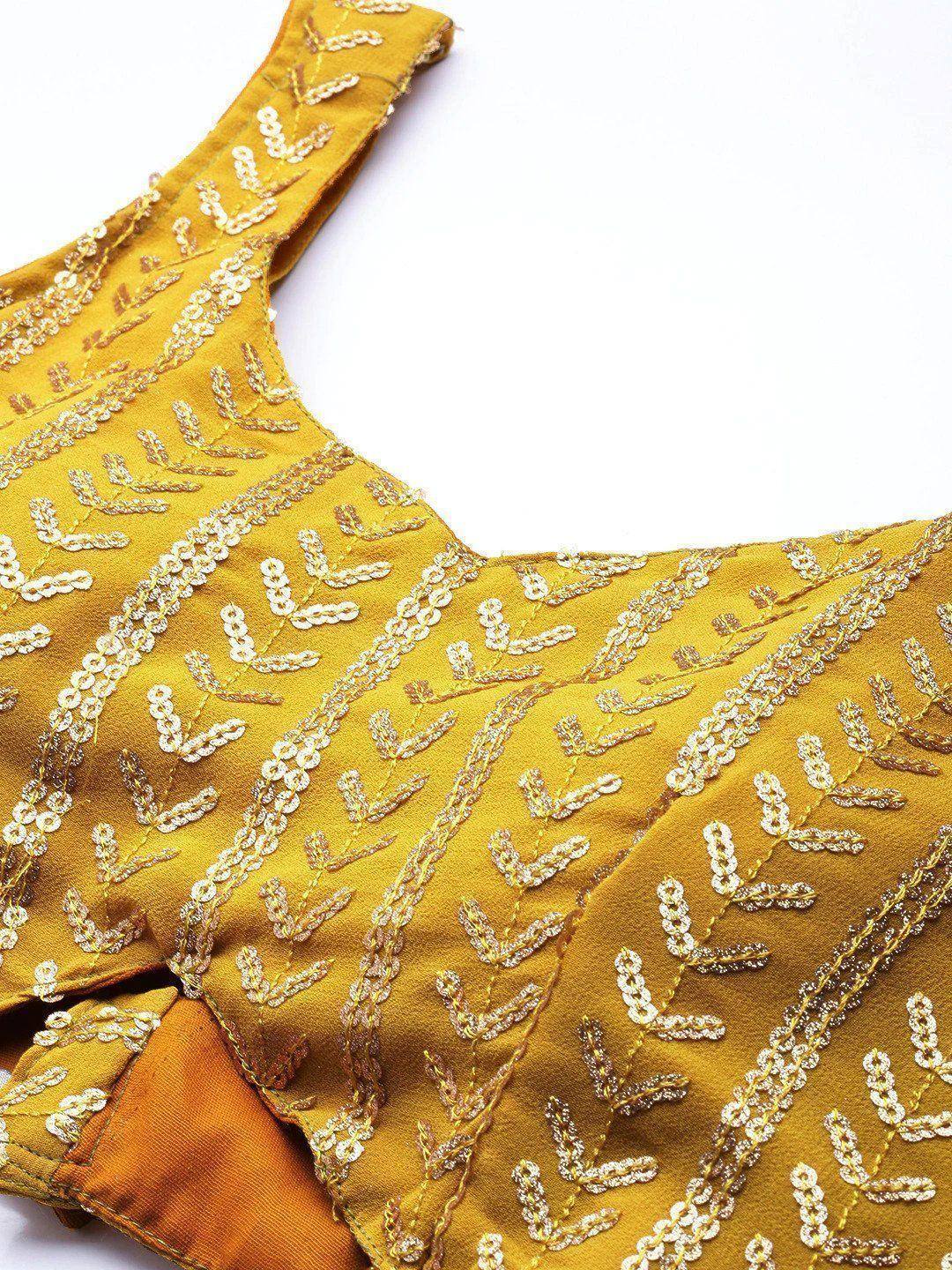 Mustard yellow ethnic blouse with intricate gold leaf embroidery and sequin detailing