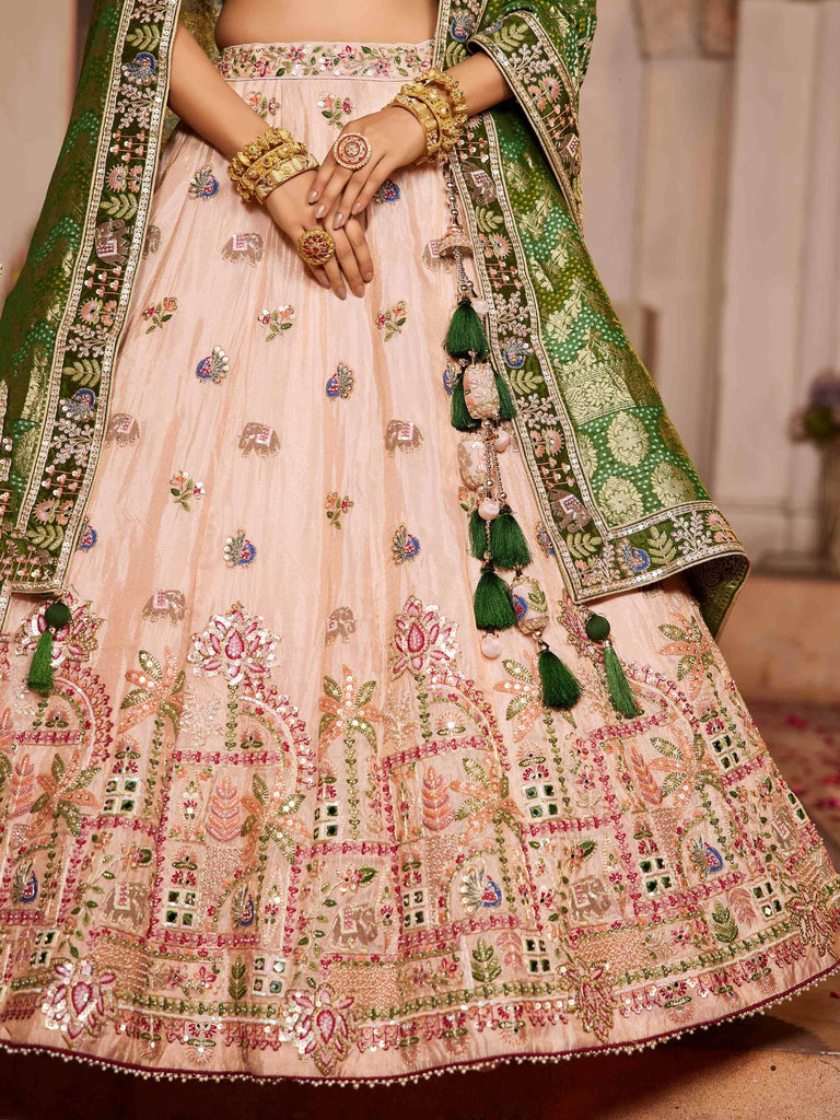 Adorning Peach Thread Embroidered Tissue Lehenga Choli With Dupatta