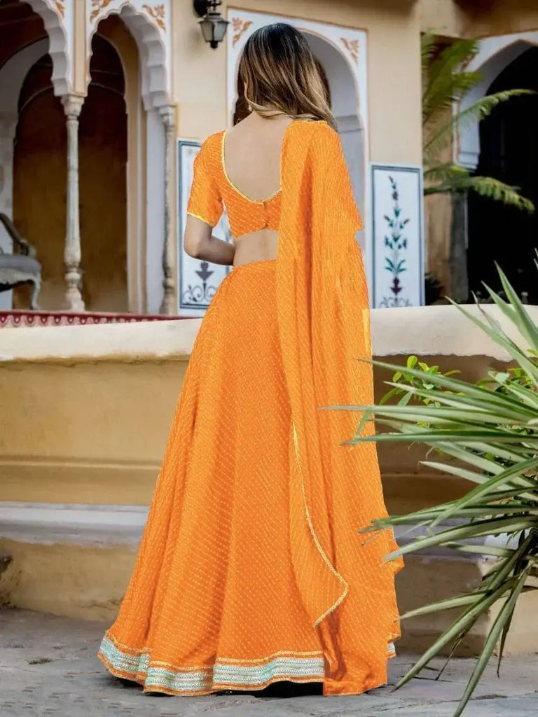 Pretty Orange Laheriya Print Georgette Wedding Lehenga Choli