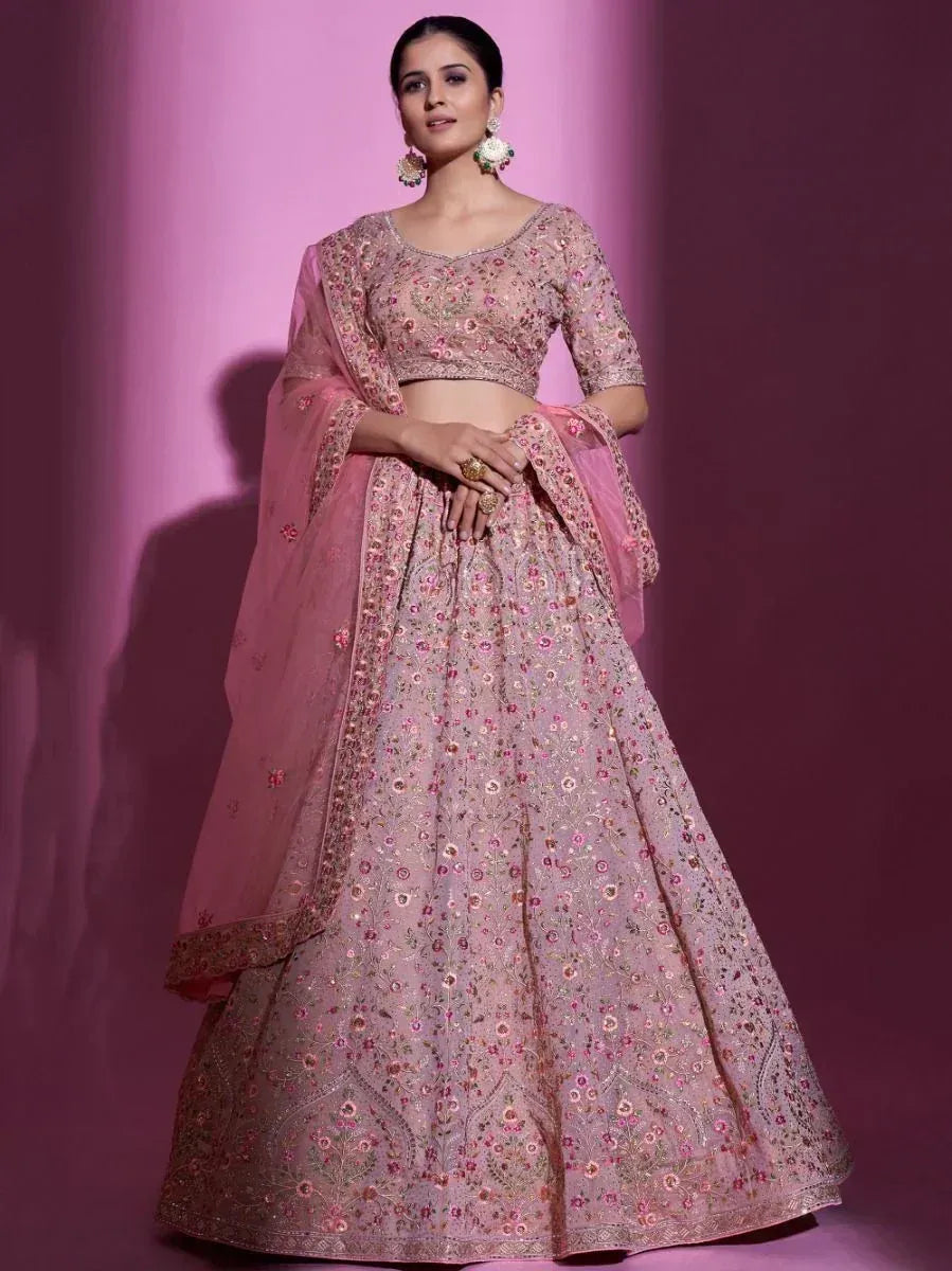 Pink floral embroidered lehenga choli with matching dupatta, perfect for Indian weddings and festive occasions.