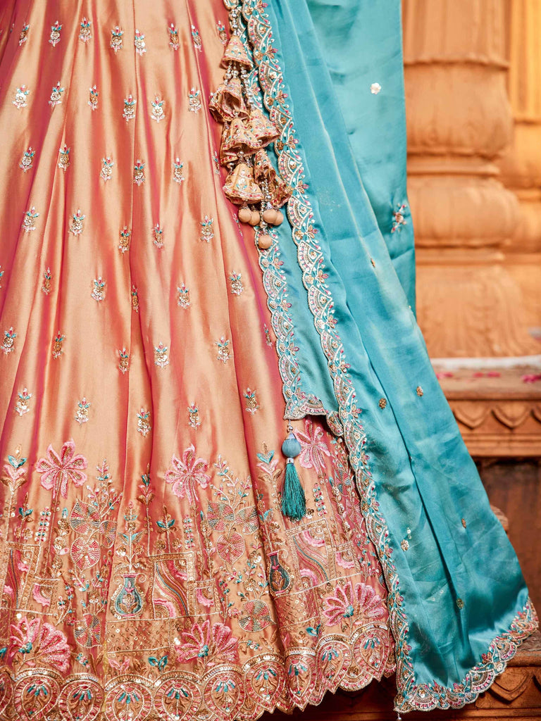 Mesmerizing Peach Thread Embroidered Georgette Lehenga Choli