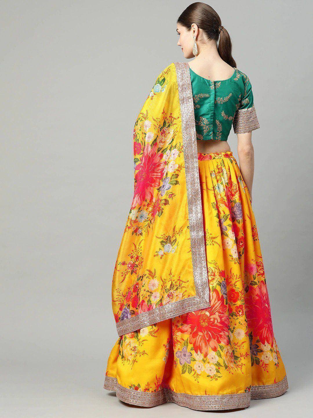 Yellow floral lehenga choli with green blouse, perfect for Indian ethnic wear occasions