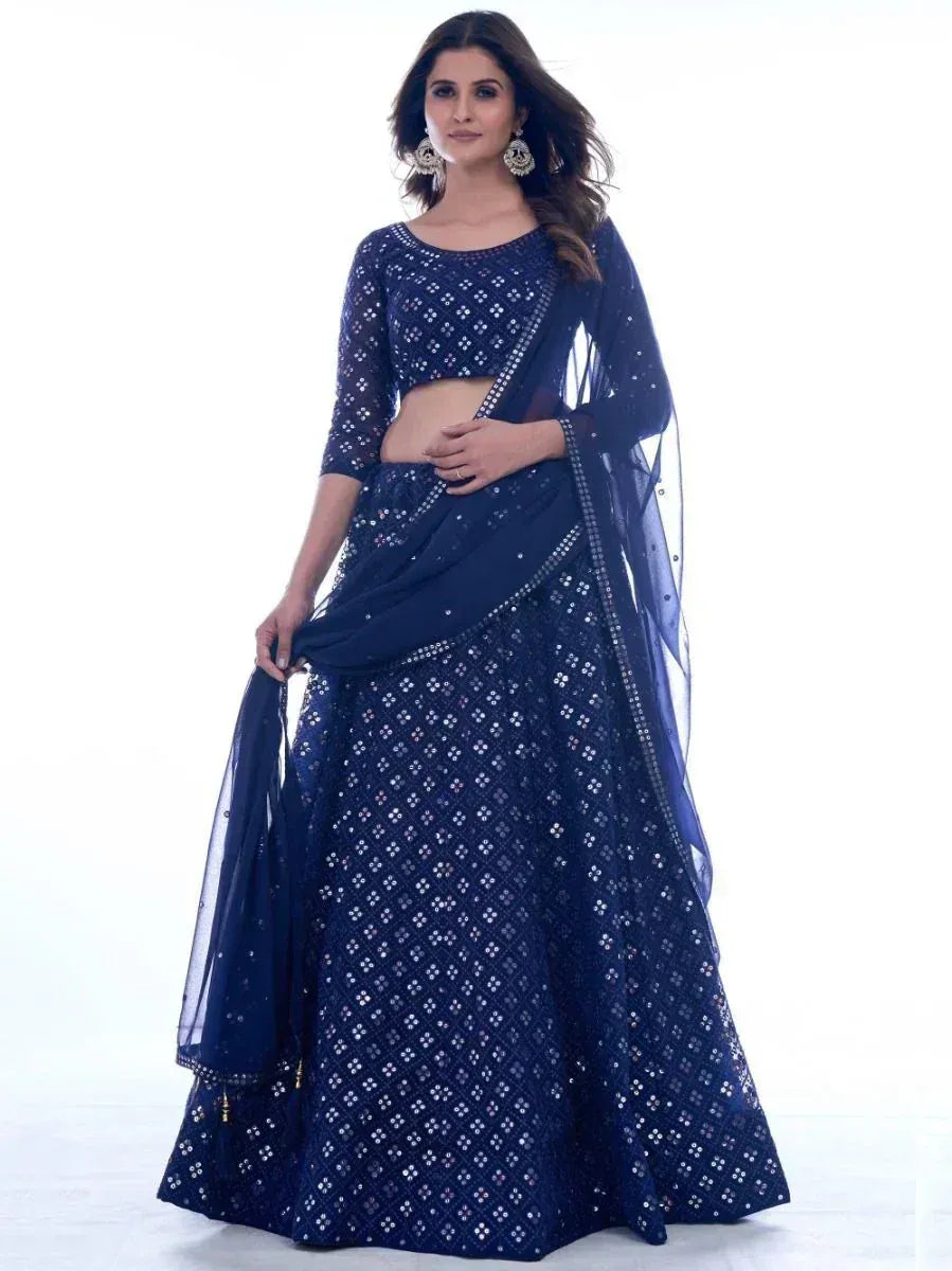 Navy blue designer lehenga choli with mirror work and sheer dupatta, ethnic Indian wear