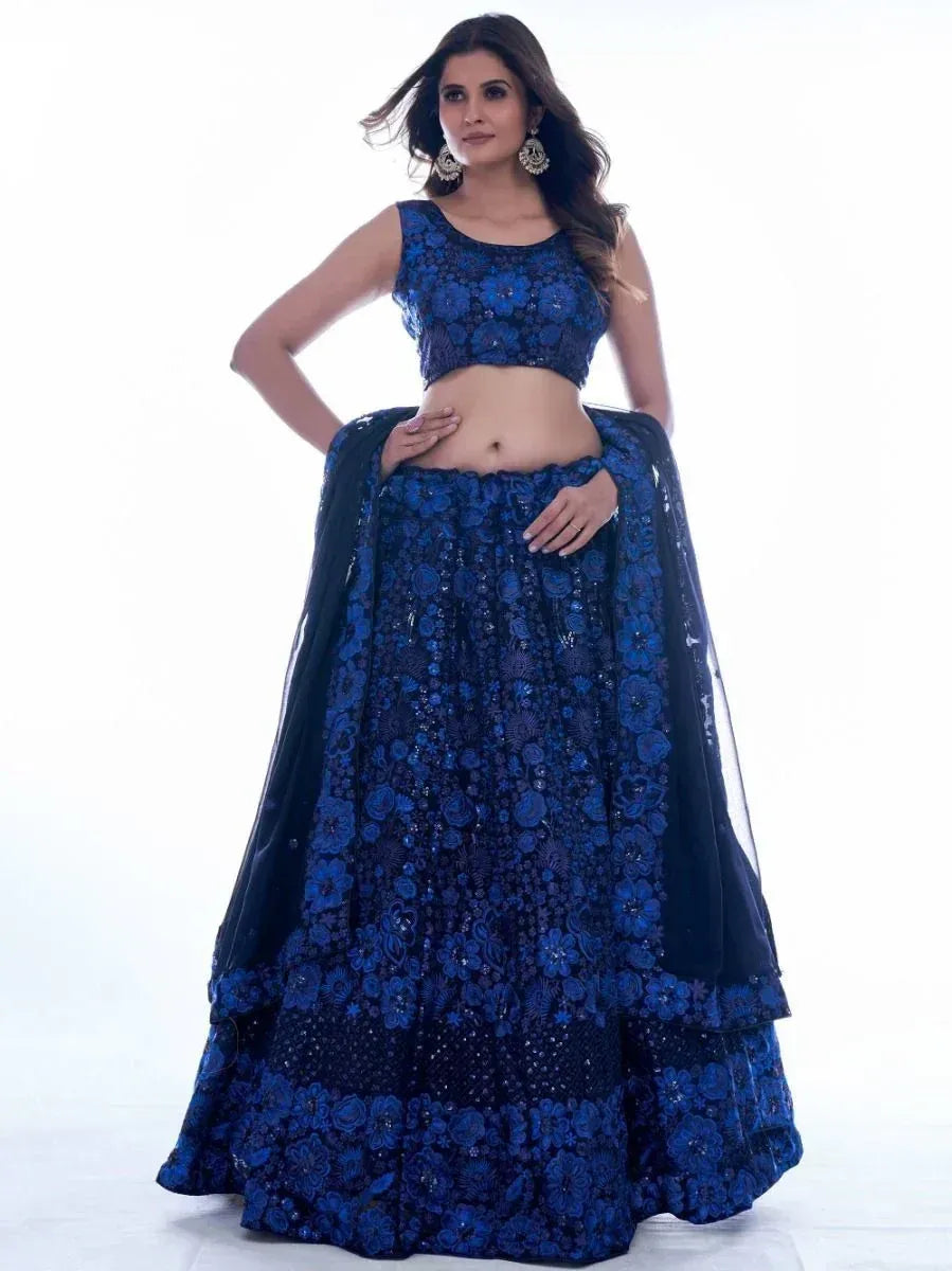 Blue floral embroidered lehenga choli with sheer dupatta, perfect for Indian ethnic occasions