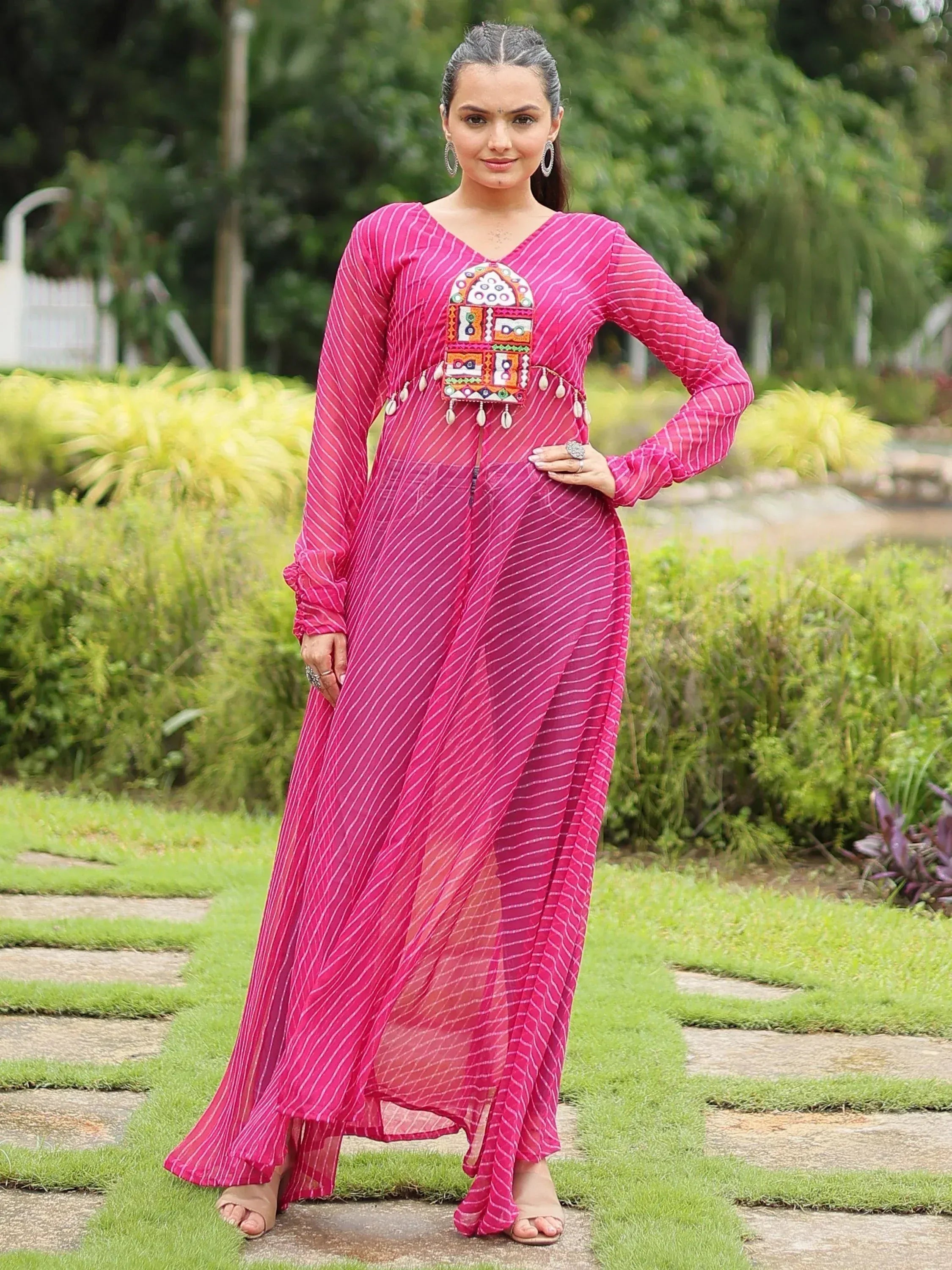 Pink striped ethnic gown with embroidered front panel, perfect for Indian occasions