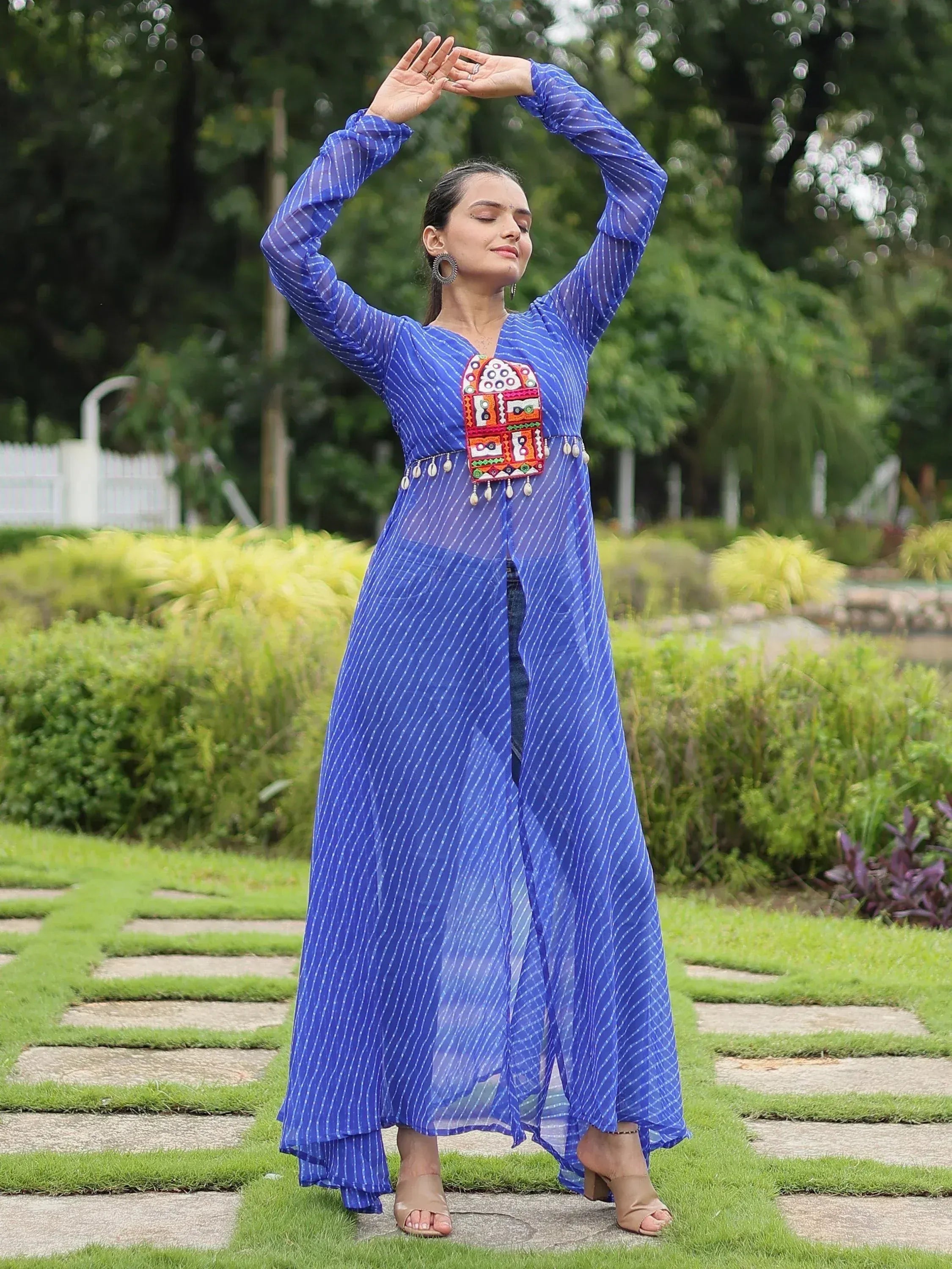 Blue striped ethnic gown with embroidered panel, perfect for Indian festive wear