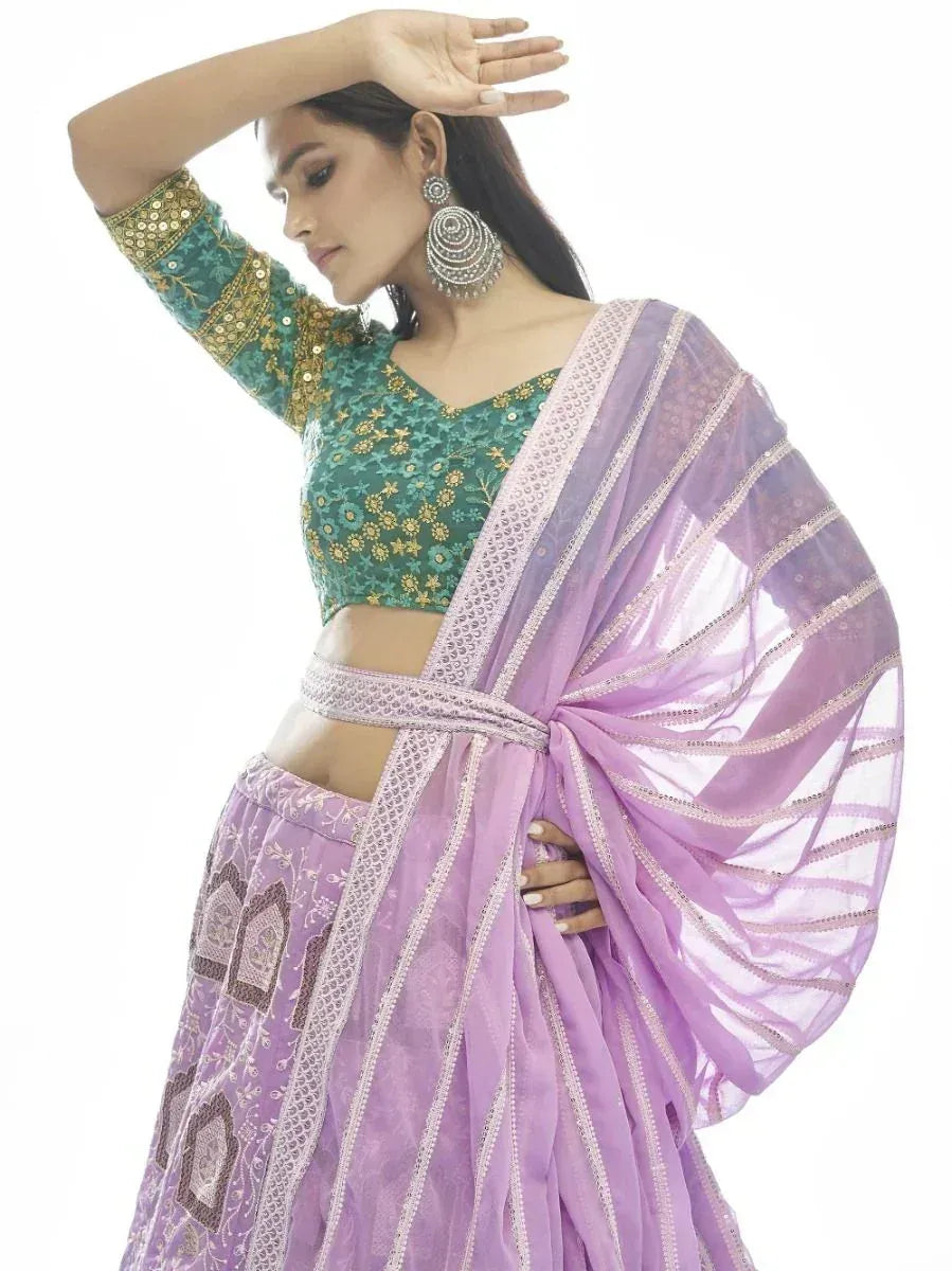 Purple lehenga choli with green floral blouse, perfect for Indian ethnic wear occasions