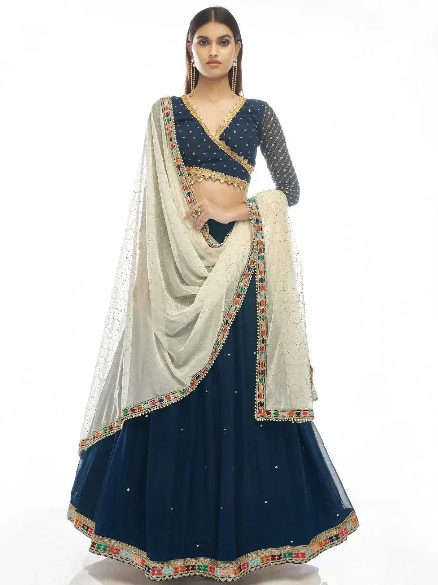 Navy blue designer lehenga choli with embroidered dupatta, perfect for Indian ethnic wear occasions