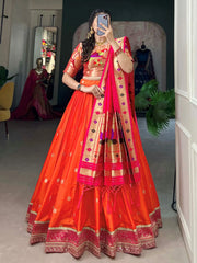 Impressive Orange Jacquard Silk Zari Weaving Lehenga Choli With Dupatta
