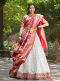 Impressive White Jacquard Silk Zari Work Lehenga Choli With Dupatta