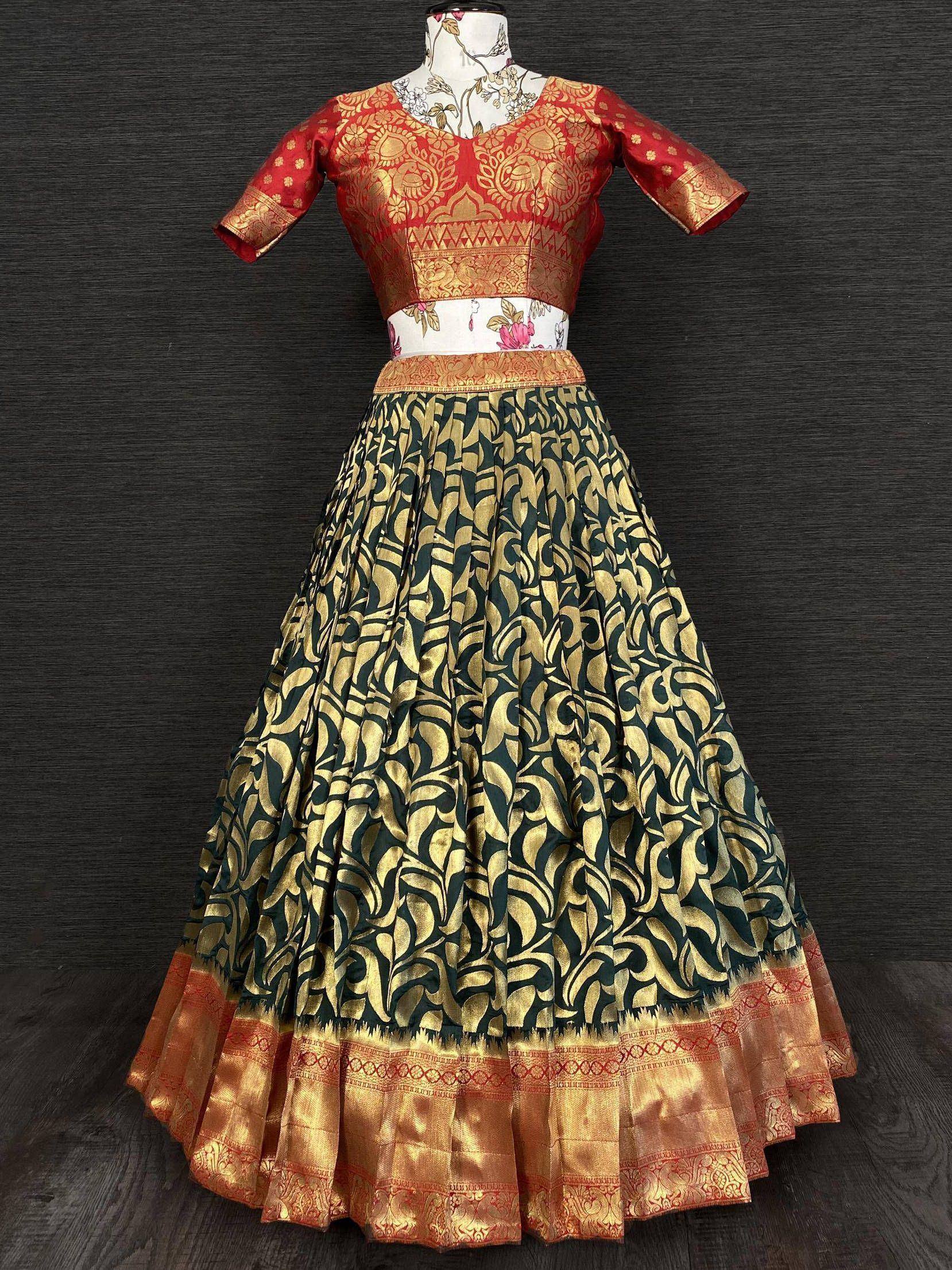 Red and gold designer lehenga choli with green floral skirt, ethnic Indian wear