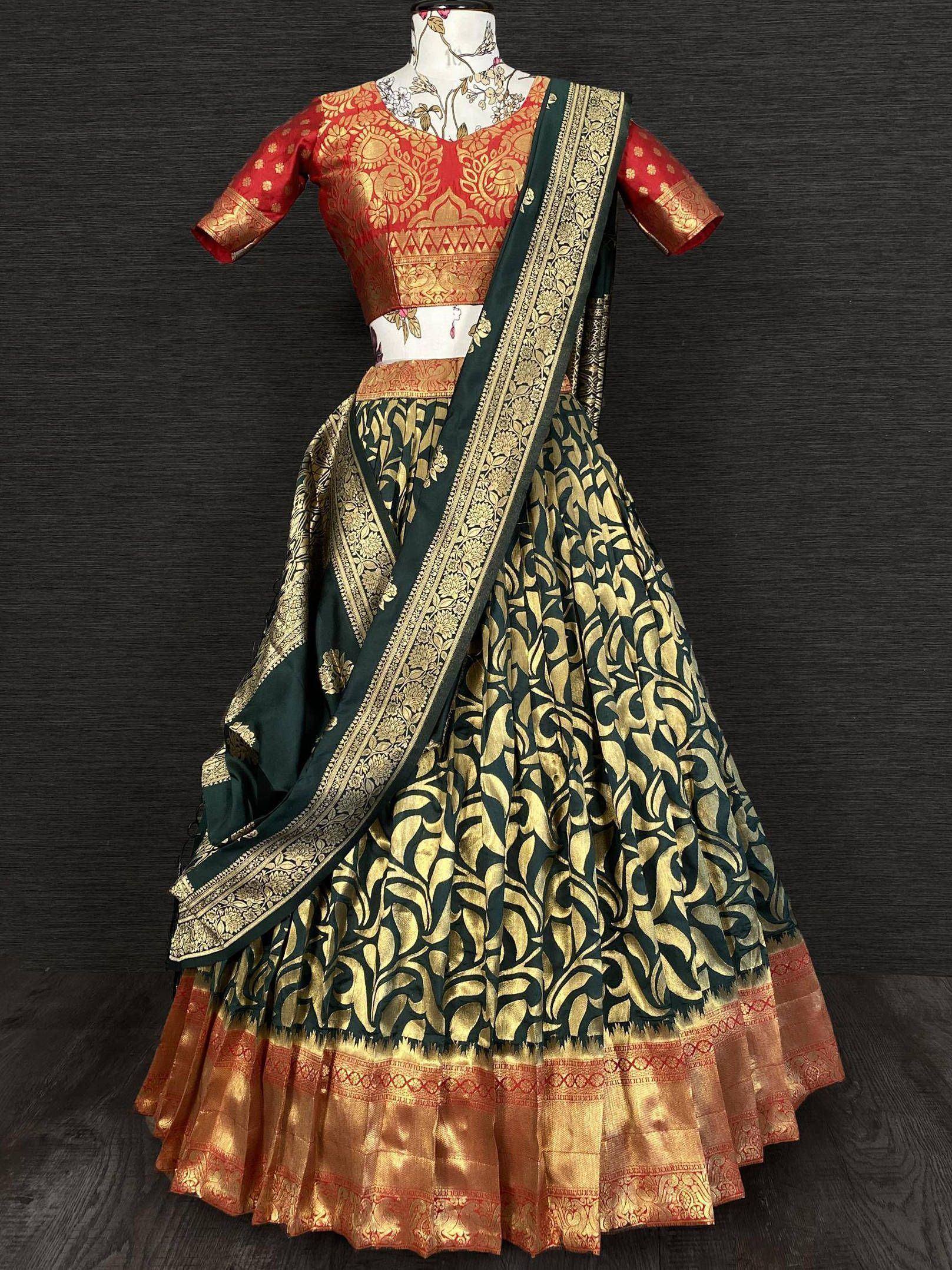 Red and green designer lehenga choli with gold floral print and border, ethnic wear for women