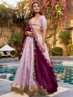 Captivating Lavender Embroidered Silk Marriage Wear Lehenga Choli