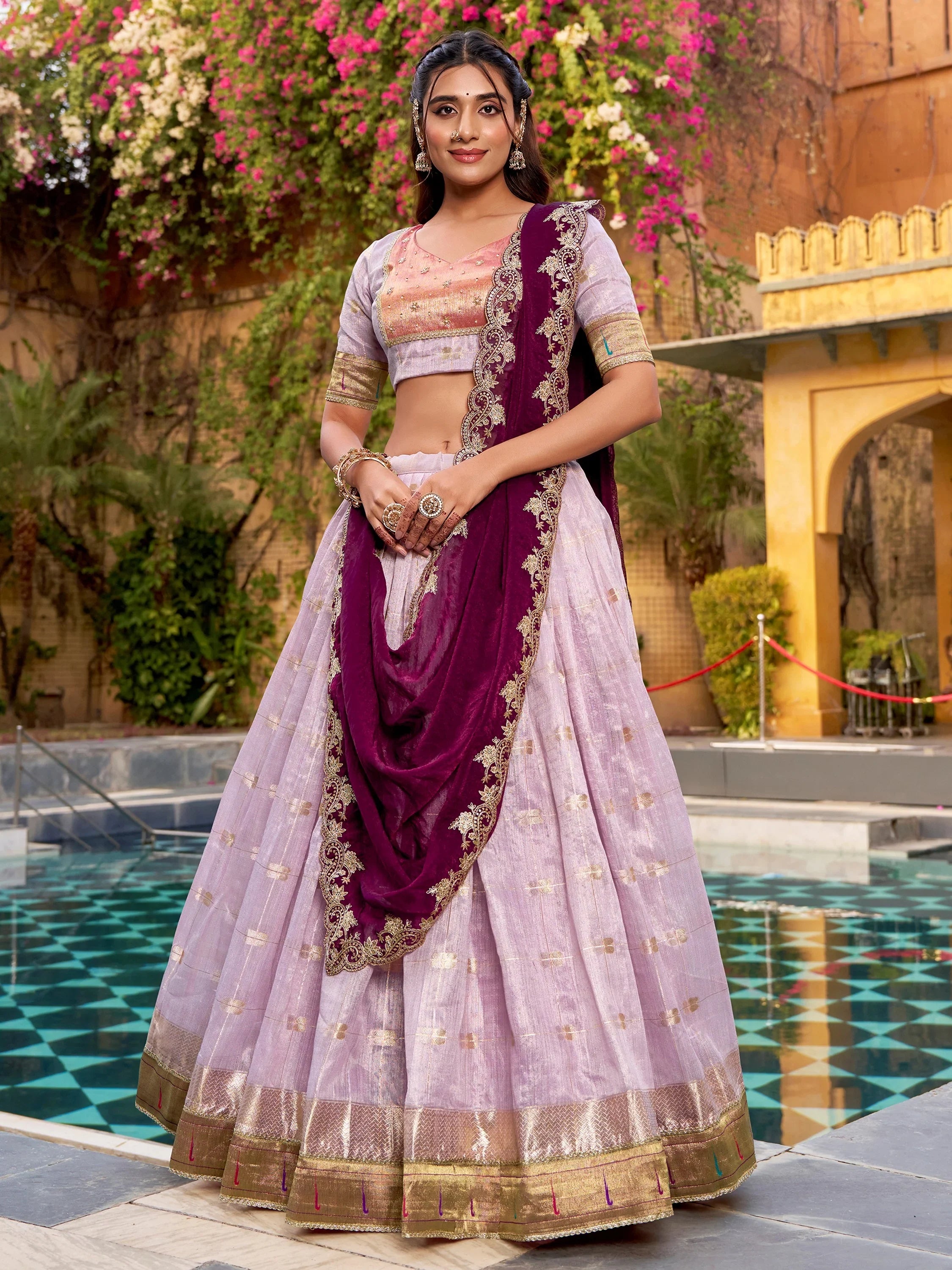Captivating Lavender Embroidered Silk Marriage Wear Lehenga Choli