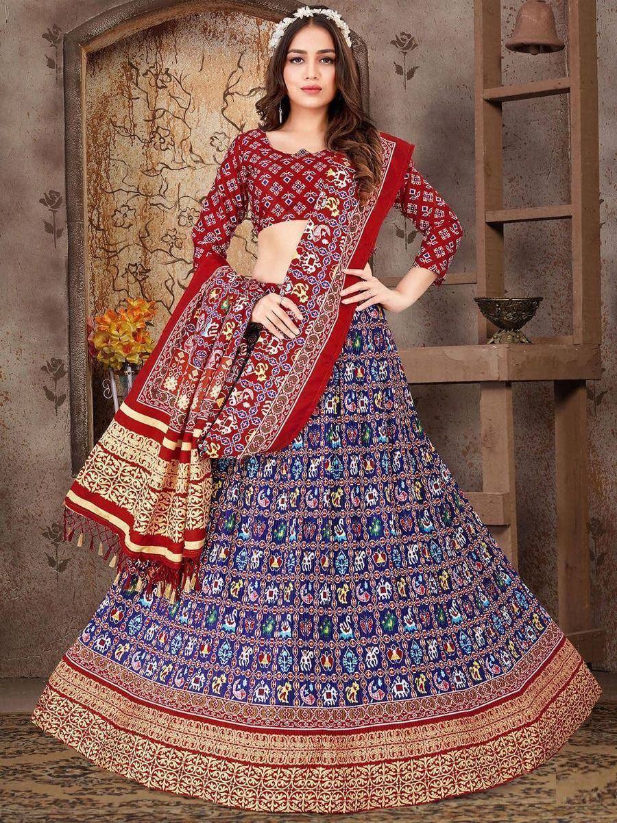 Designer lehenga choli with elephant print, red blouse, and embroidered dupatta for Indian ethnic wear